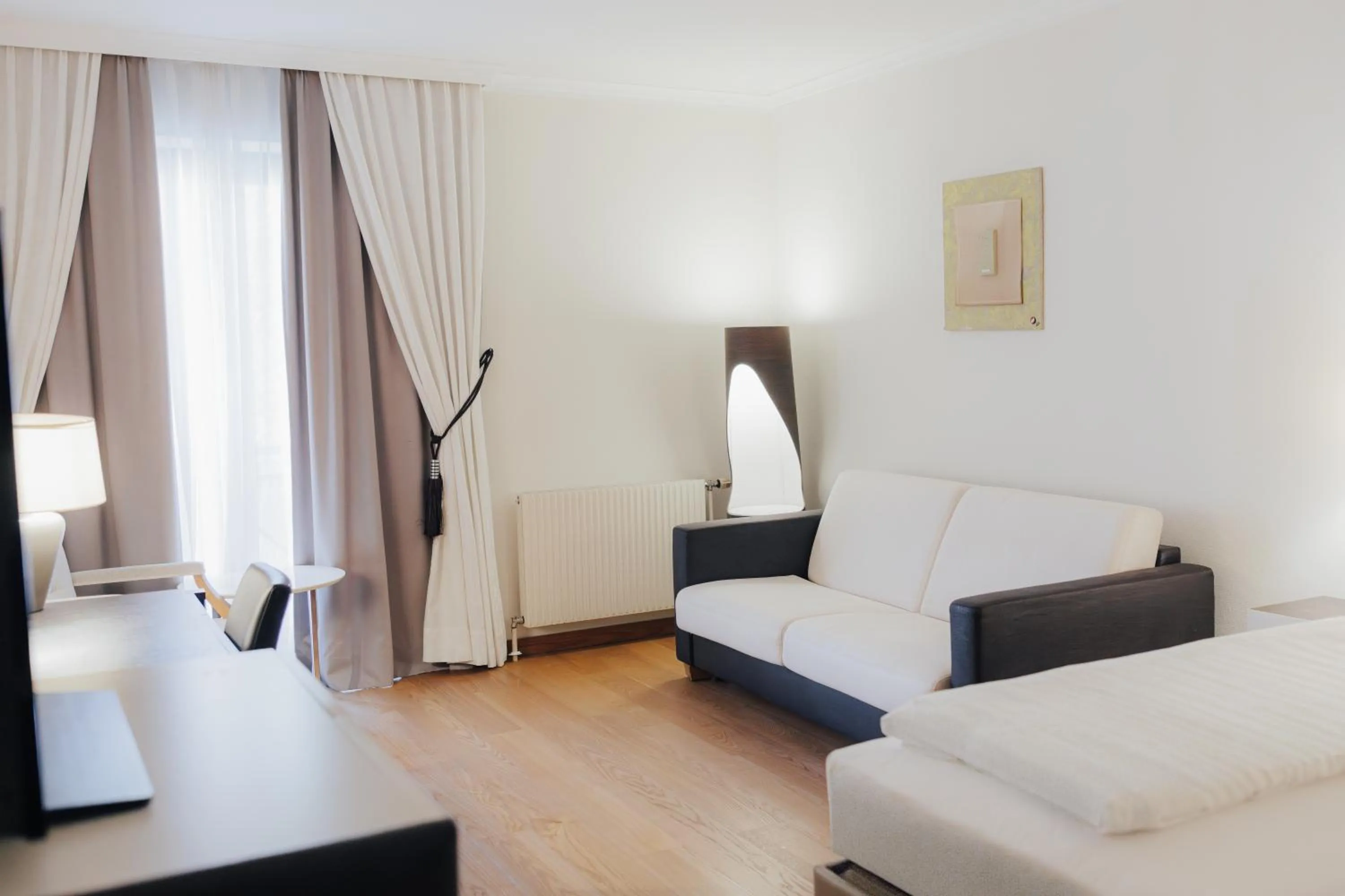 Seating area, Bed in Steigenberger Hotel & Spa Krems