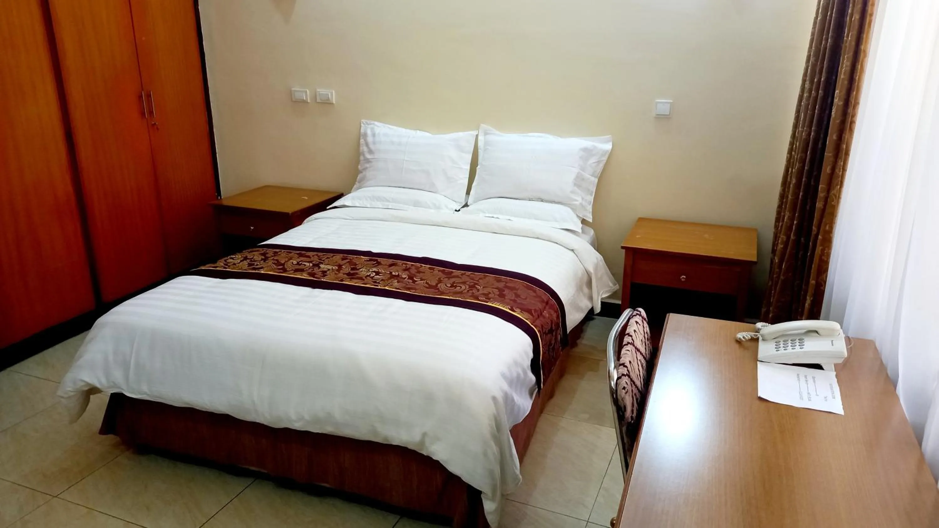 Bed in GHION HOTEL