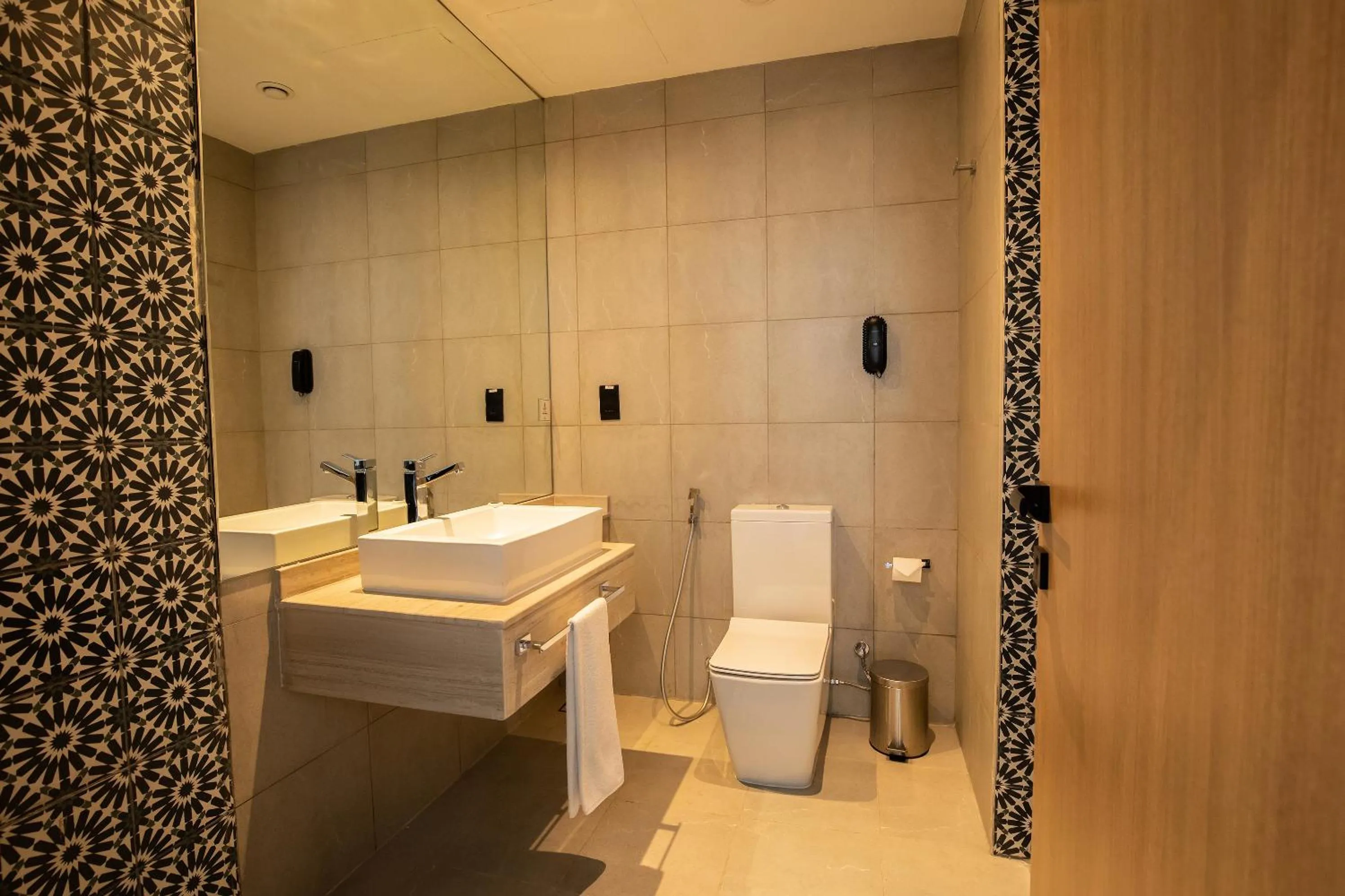 Toilet in Grand Kingsgate Jaddaf Waterfront Hotel by Millennium