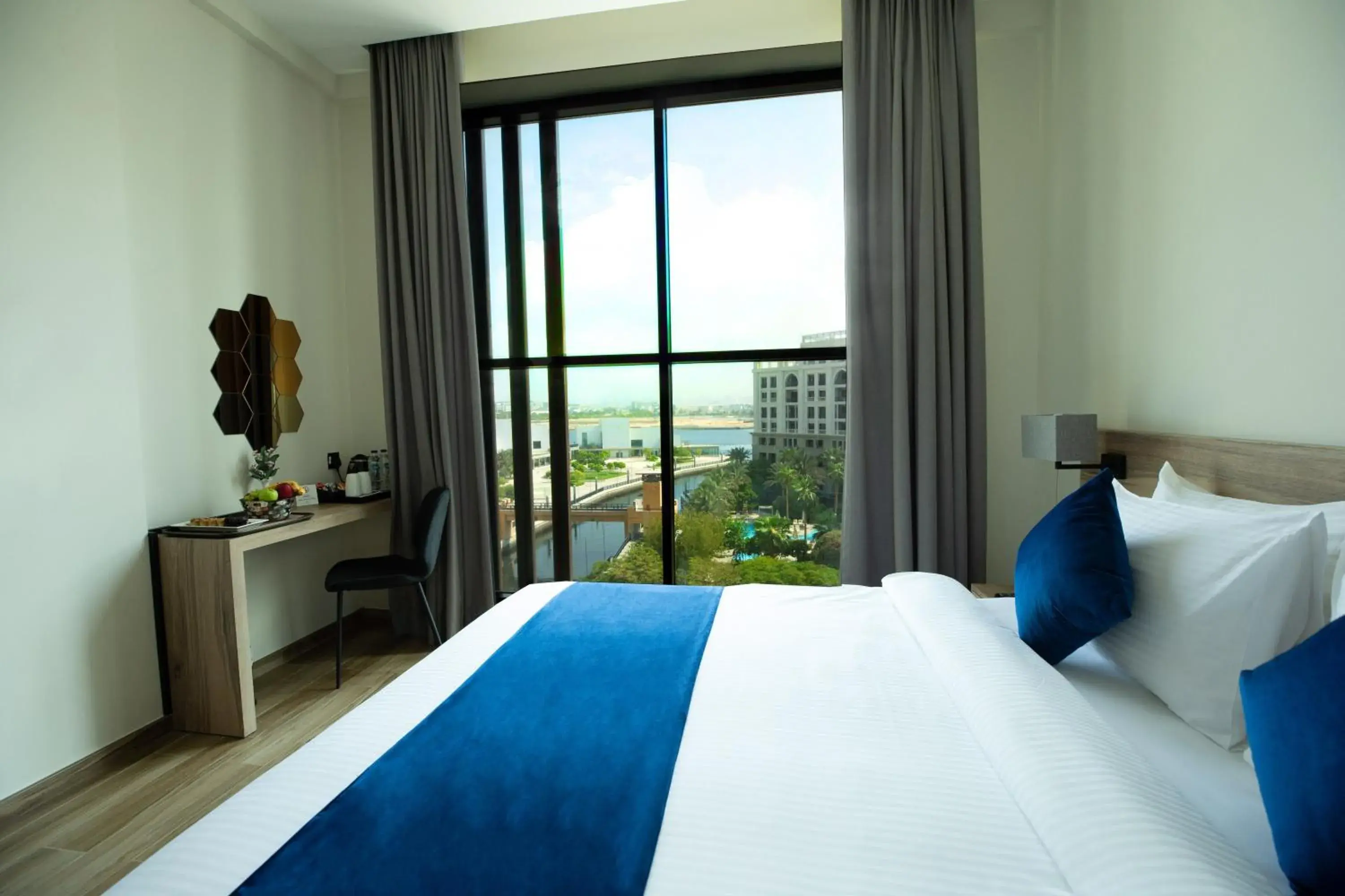 View (from property/room), Bed in Grand Kingsgate Jaddaf Waterfront Hotel by Millennium View (from property/room), Bed in Grand Kingsgate Jaddaf Waterfront Hotel by Millennium