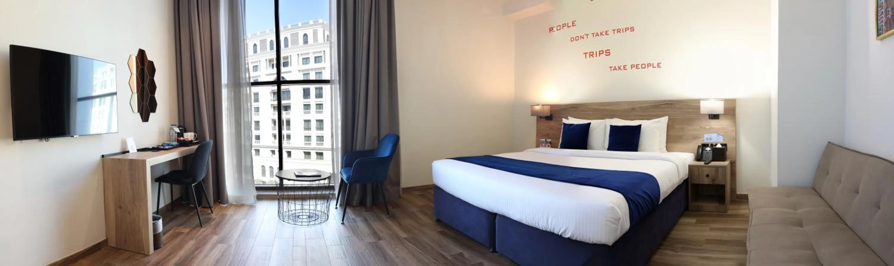 Photo of the whole room, Bed in Grand Kingsgate Jaddaf Waterfront Hotel by Millennium