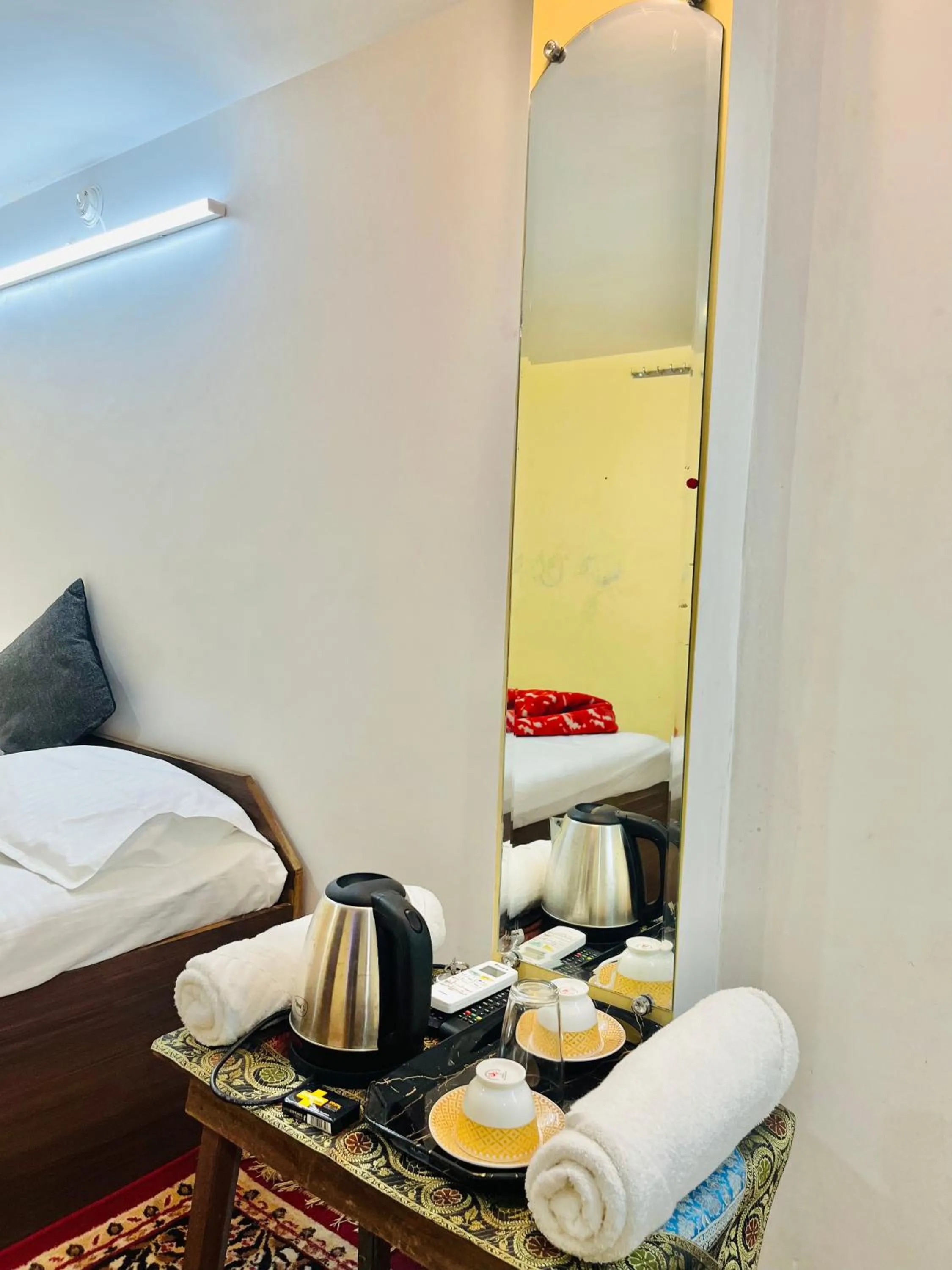 Photo of the whole room, Bed in Ganga Guest House