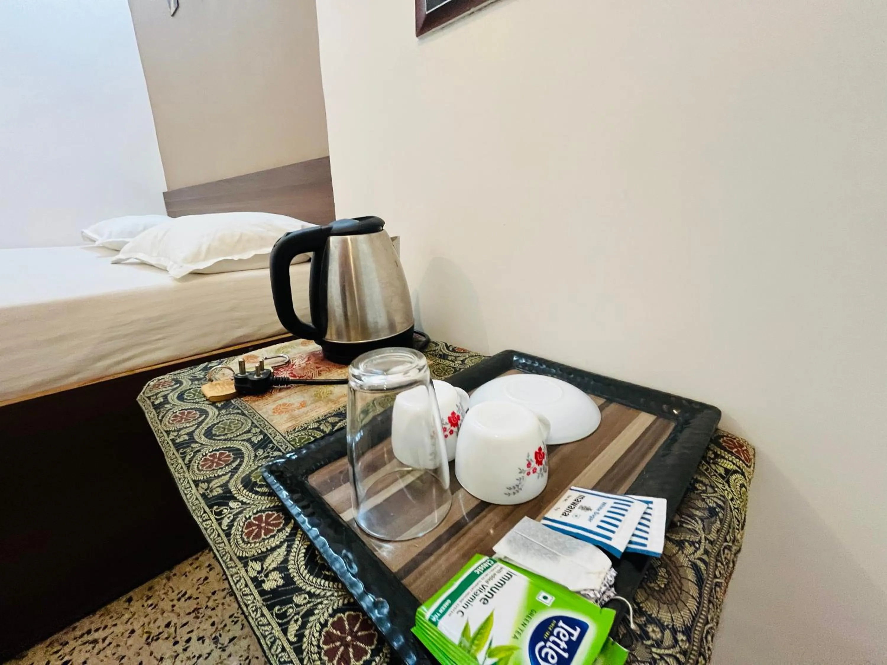 Coffee/tea facilities, Bed in Ganga Guest House