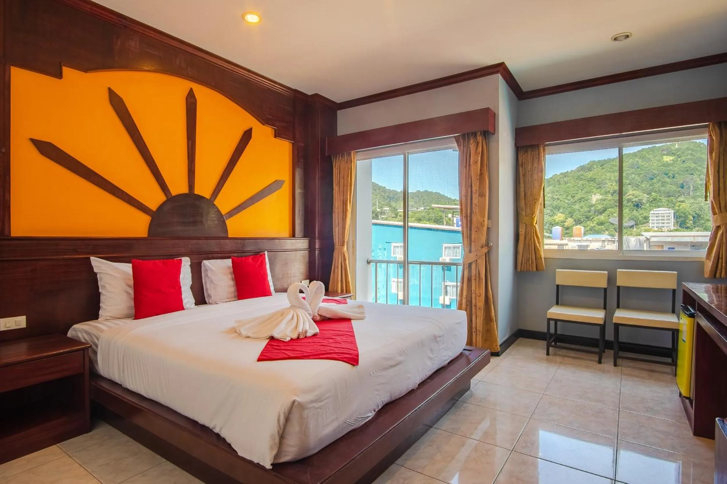 Bed in Art Mansion Patong Hotel