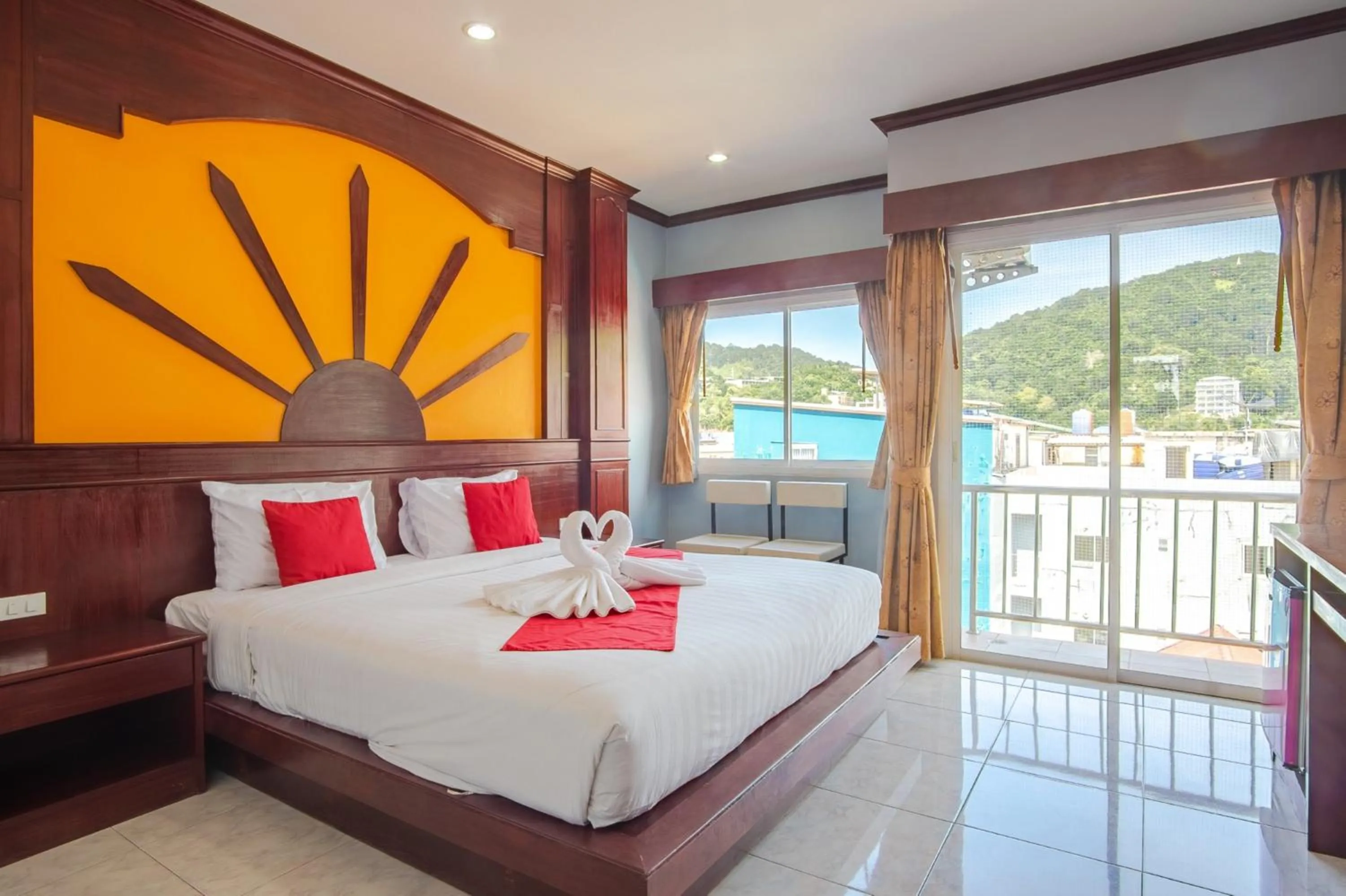 Bed in Art Mansion Patong Hotel