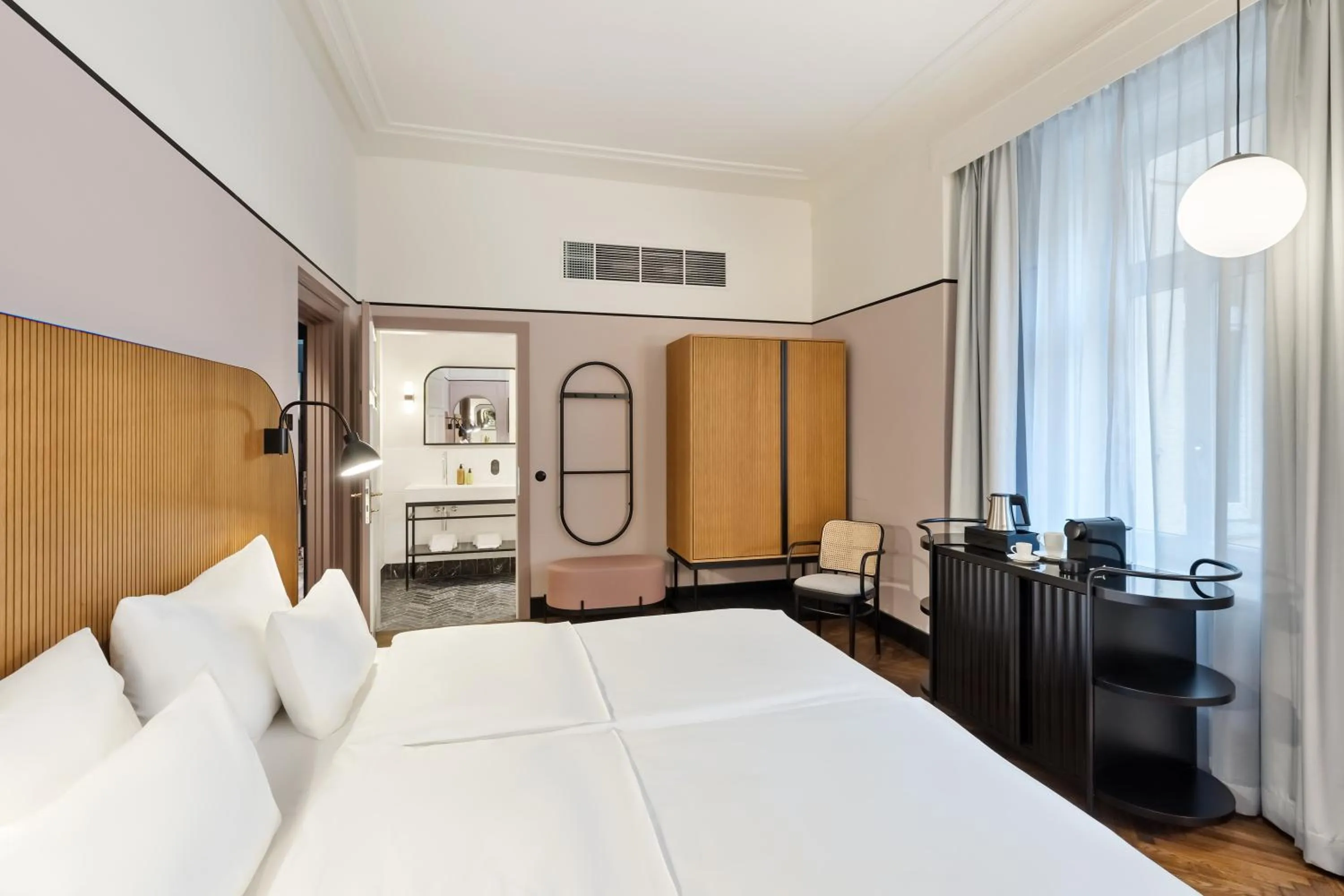 Bed in Hotel Astoria Vienna, Curio Collection by Hilton