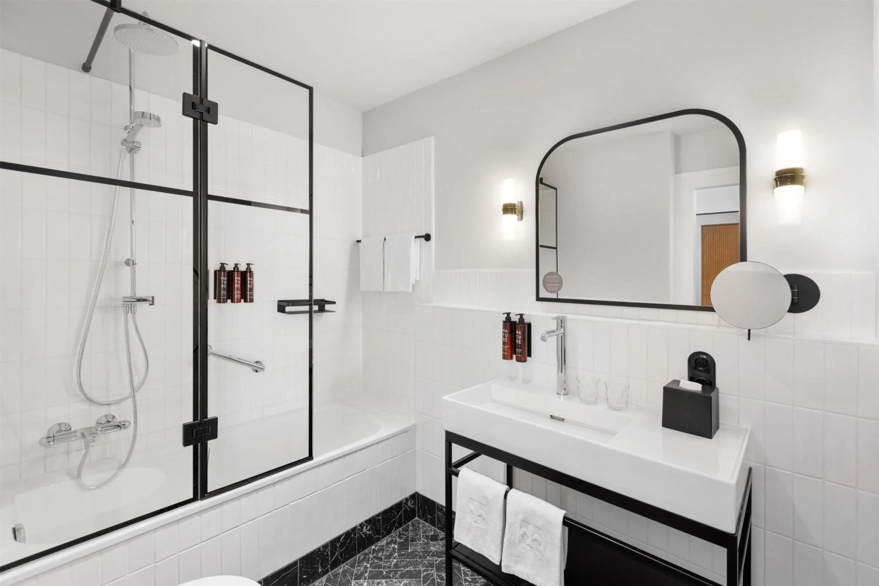 Bathroom in Hotel Astoria Vienna, Curio Collection by Hilton
