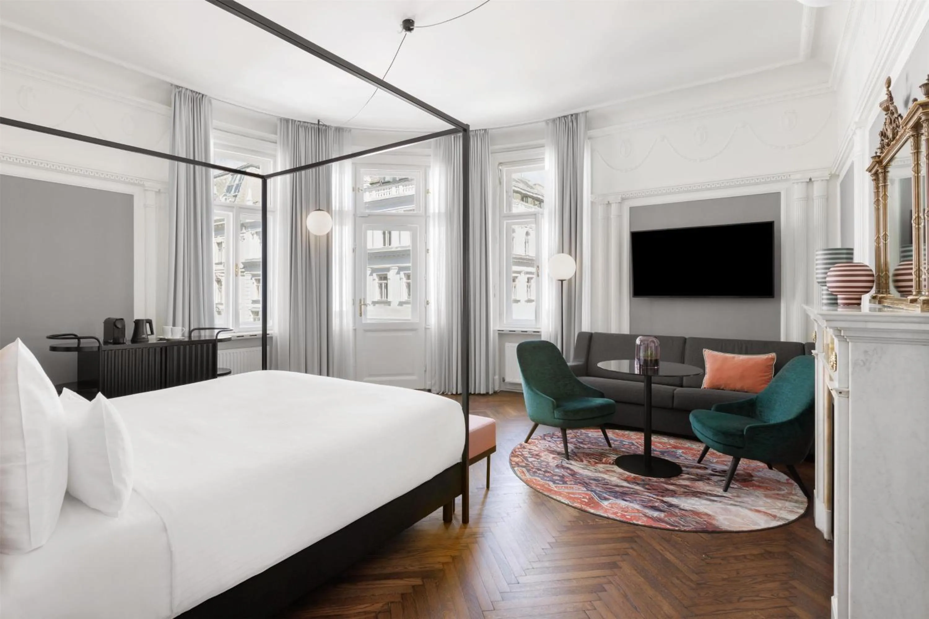Living room, Bed in Hotel Astoria Vienna, Curio Collection by Hilton