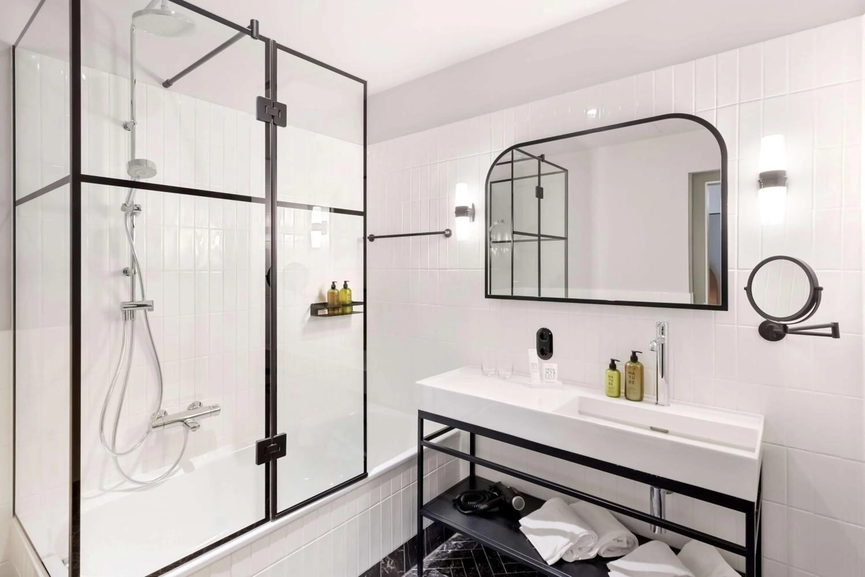Bathroom in Hotel Astoria Vienna, Curio Collection by Hilton