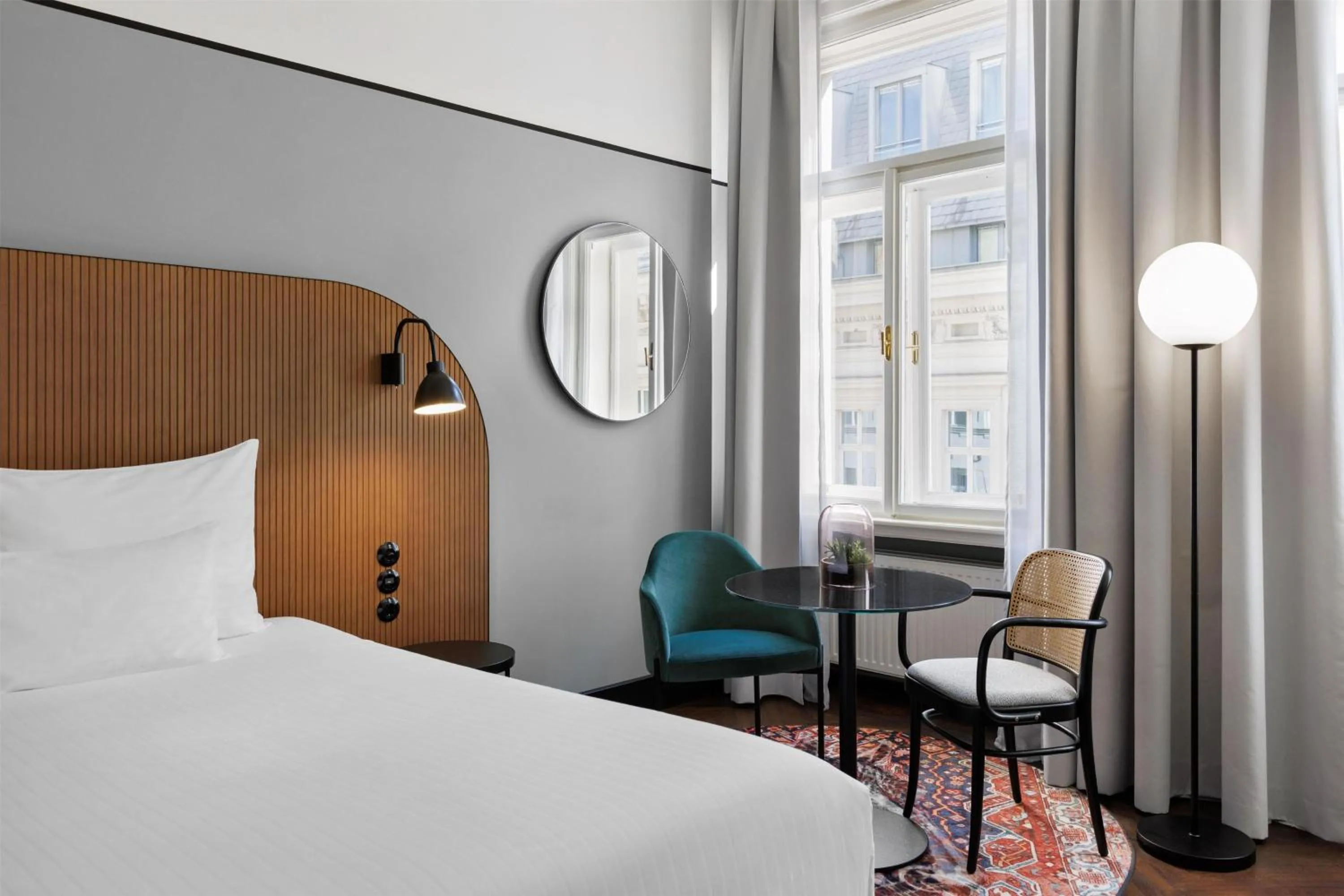 Bed in Hotel Astoria Vienna, Curio Collection by Hilton