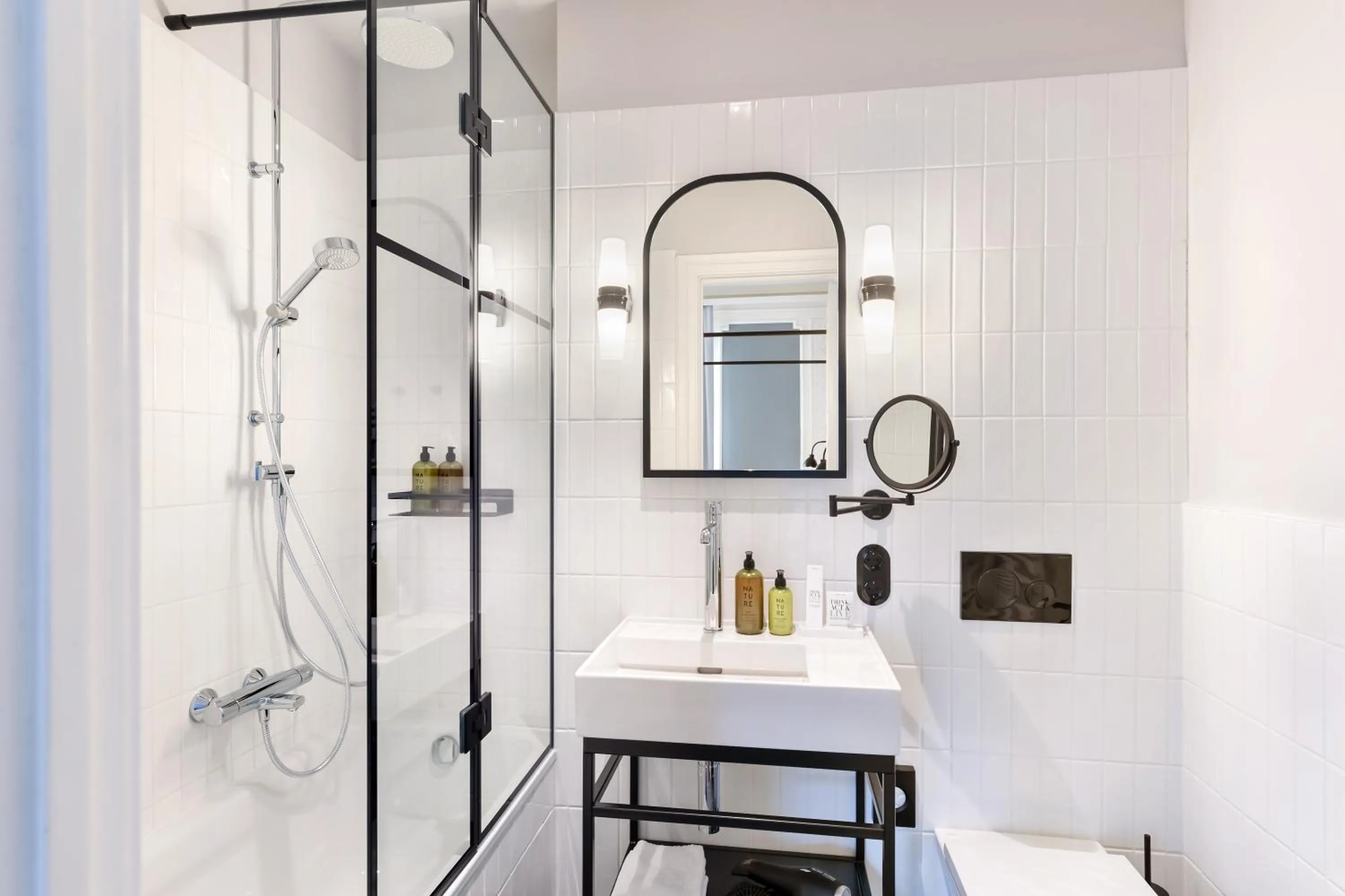 Bathroom in Hotel Astoria Vienna, Curio Collection by Hilton