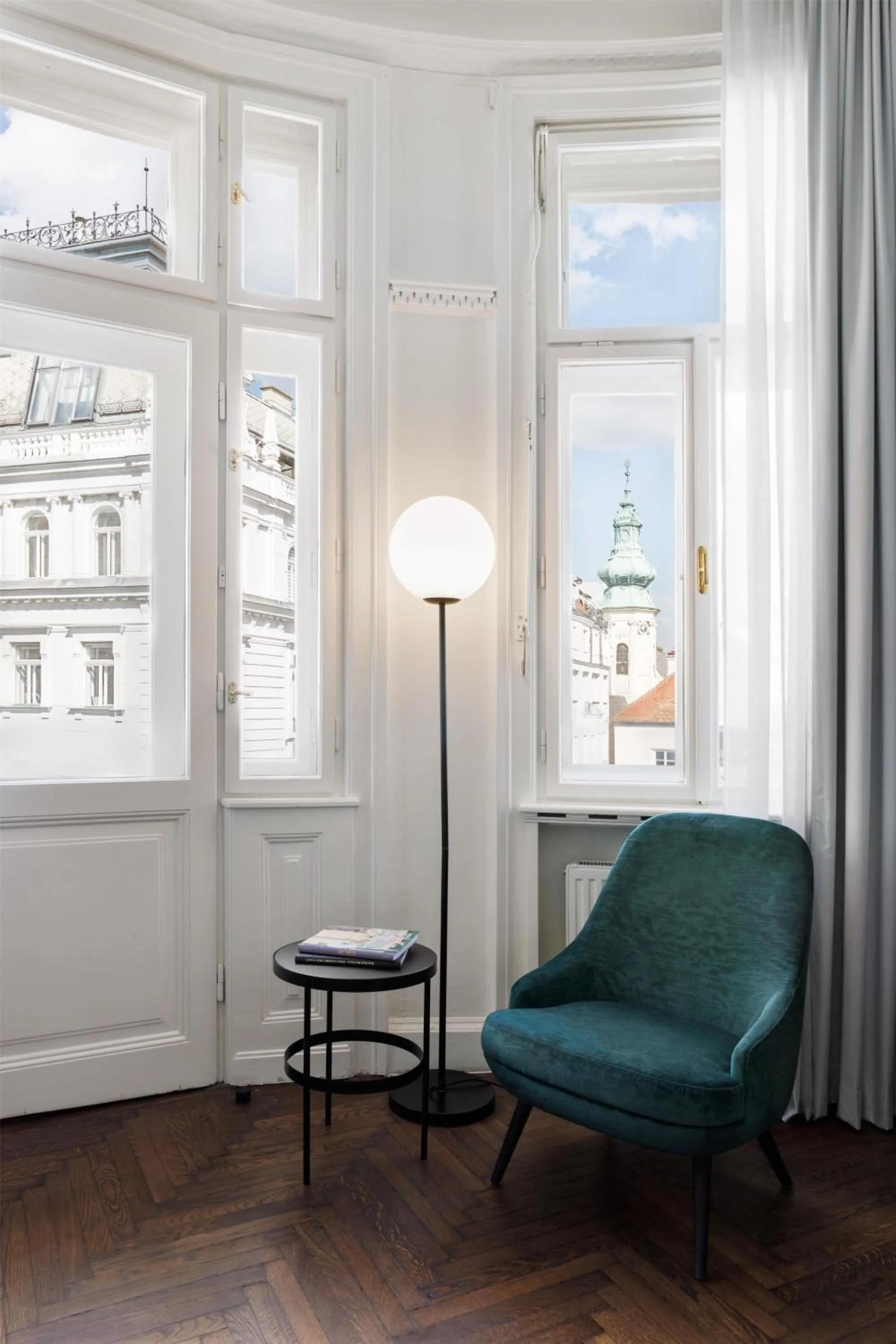 Living room in Hotel Astoria Vienna, Curio Collection by Hilton