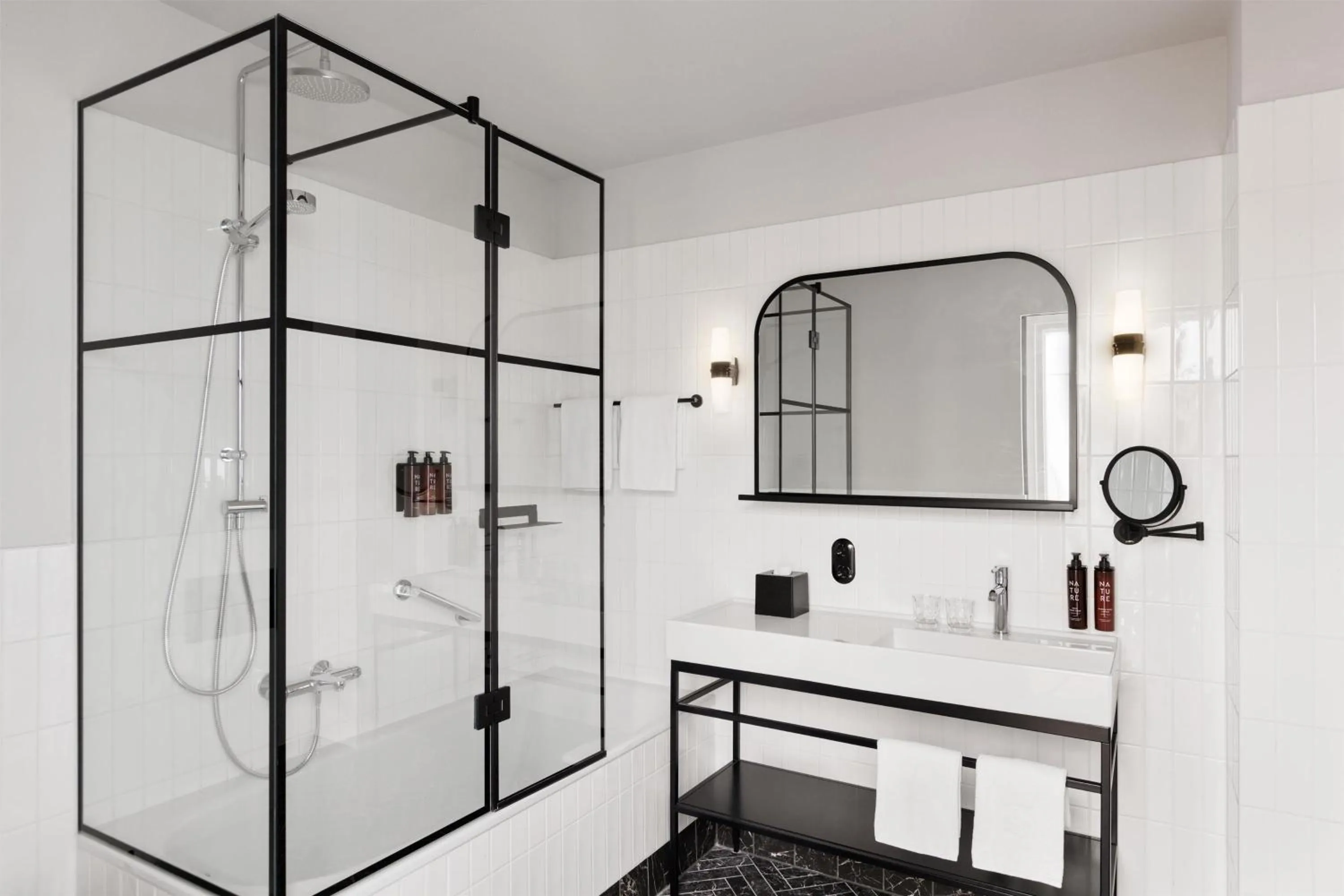 Bathroom in Hotel Astoria Vienna, Curio Collection by Hilton