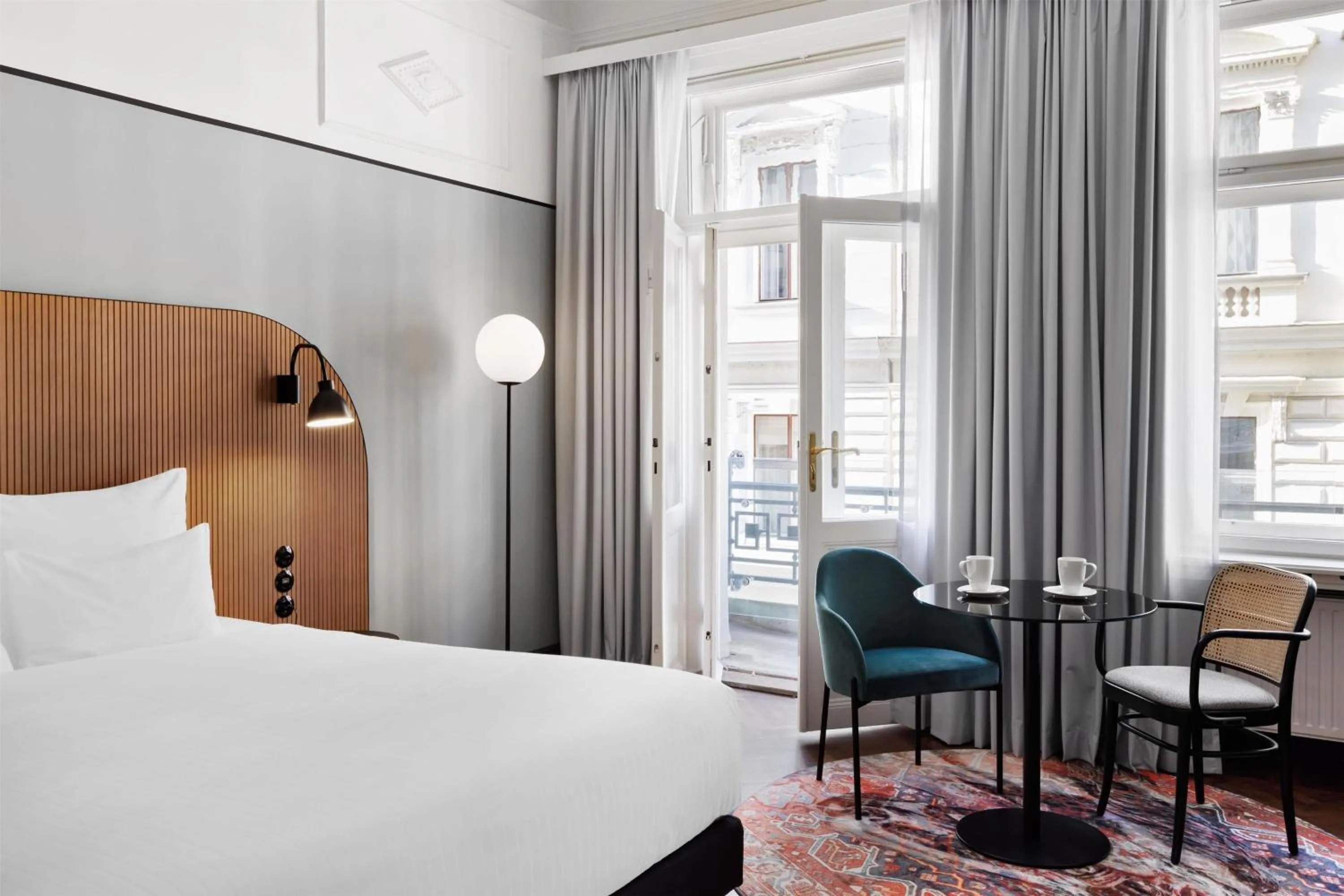 Bed in Hotel Astoria Vienna, Curio Collection by Hilton
