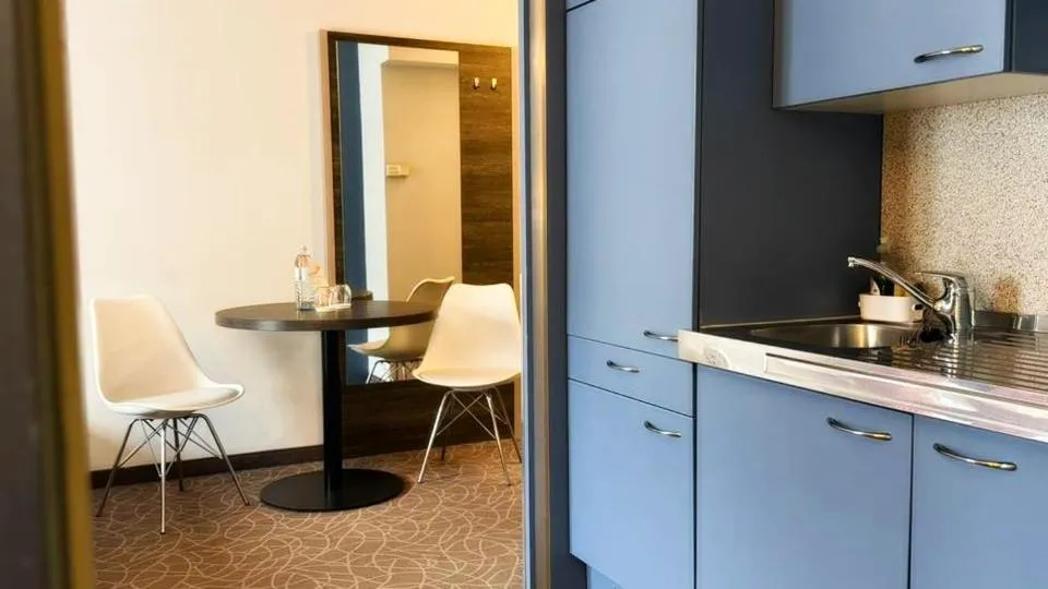 Kitchen or kitchenette in Arion Cityhotel Vienna