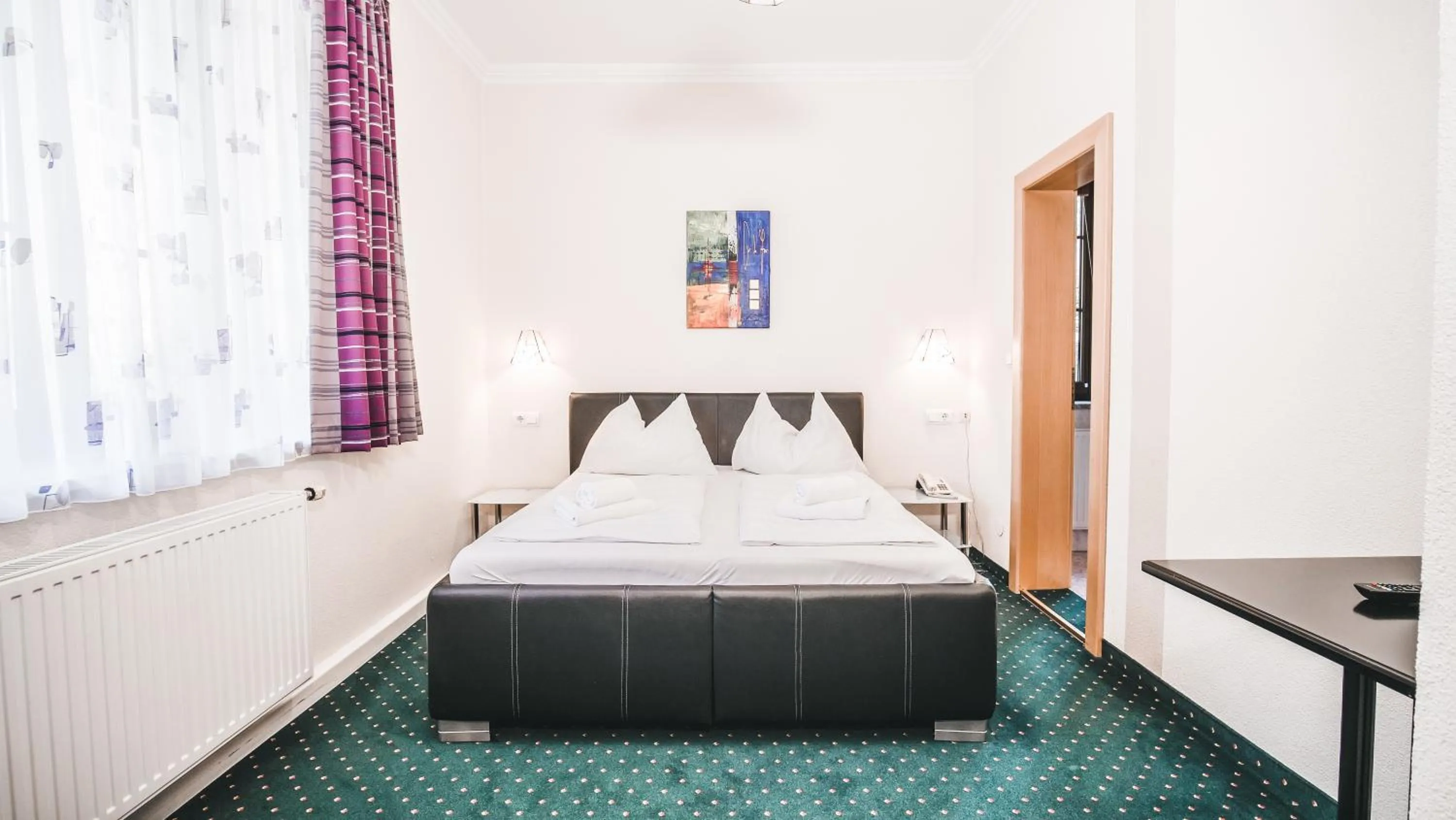 Bedroom, Bed in Hotel Kärntnerhof Velden by S4Y