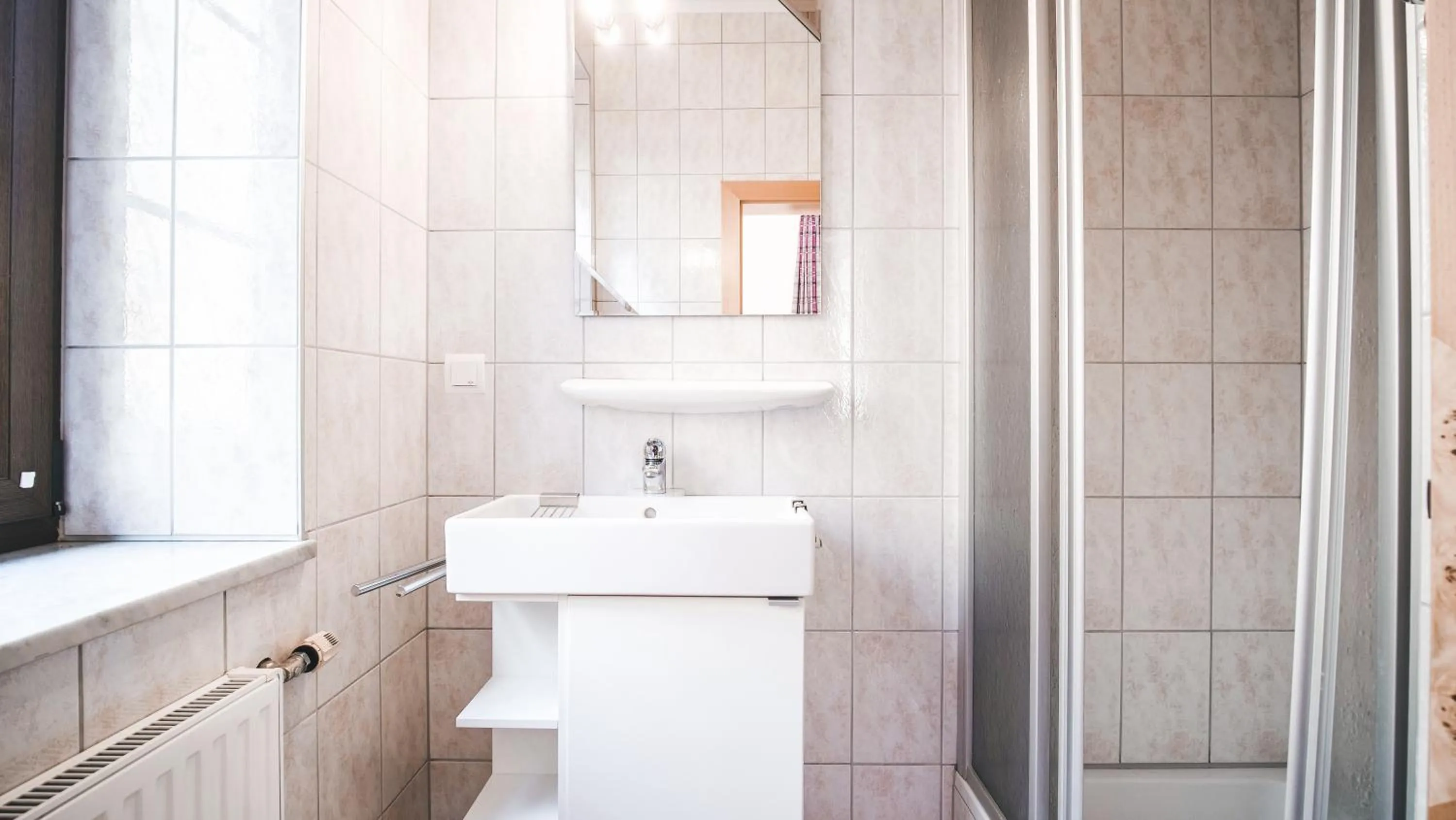 Bathroom in Hotel Kärntnerhof Velden by S4Y