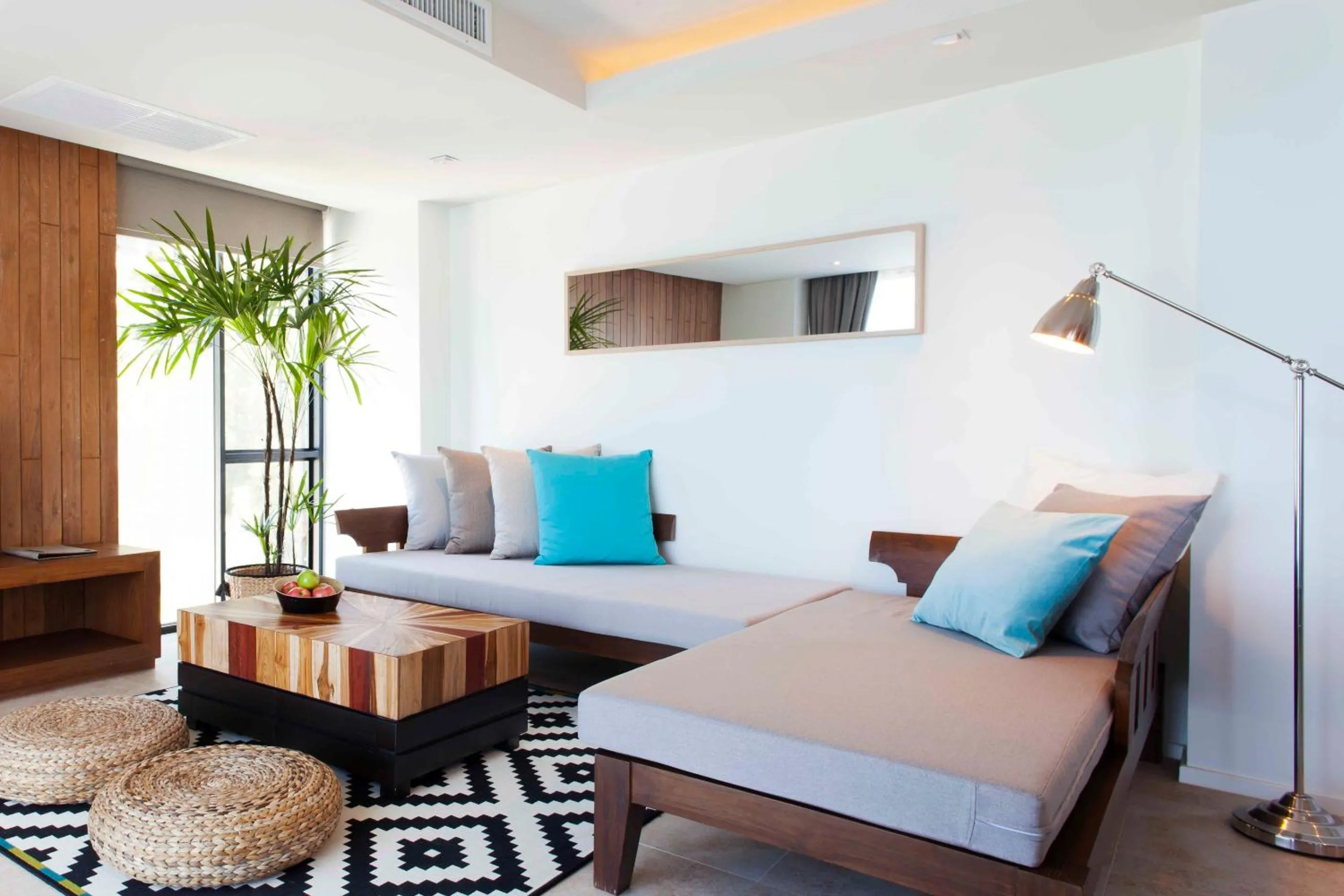 Seating area in Zenmaya Oceanfront Phuket, Trademark Collection by Wyndham