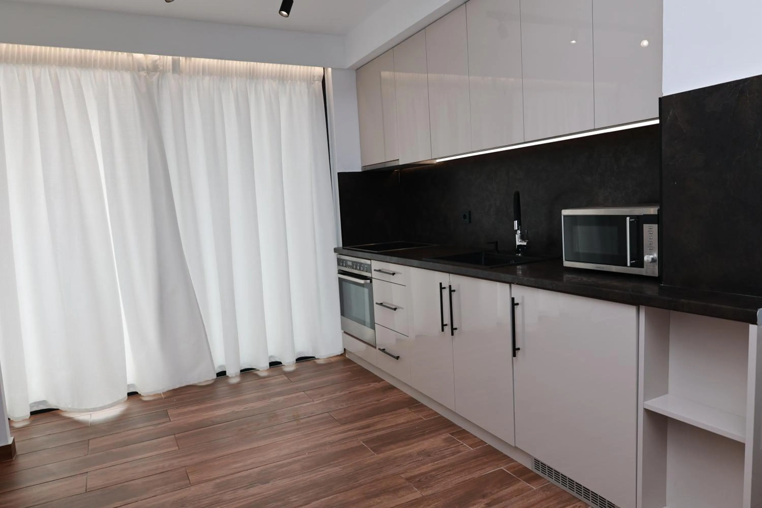 Kitchen or kitchenette in Paris-Irini Studios And Apartments