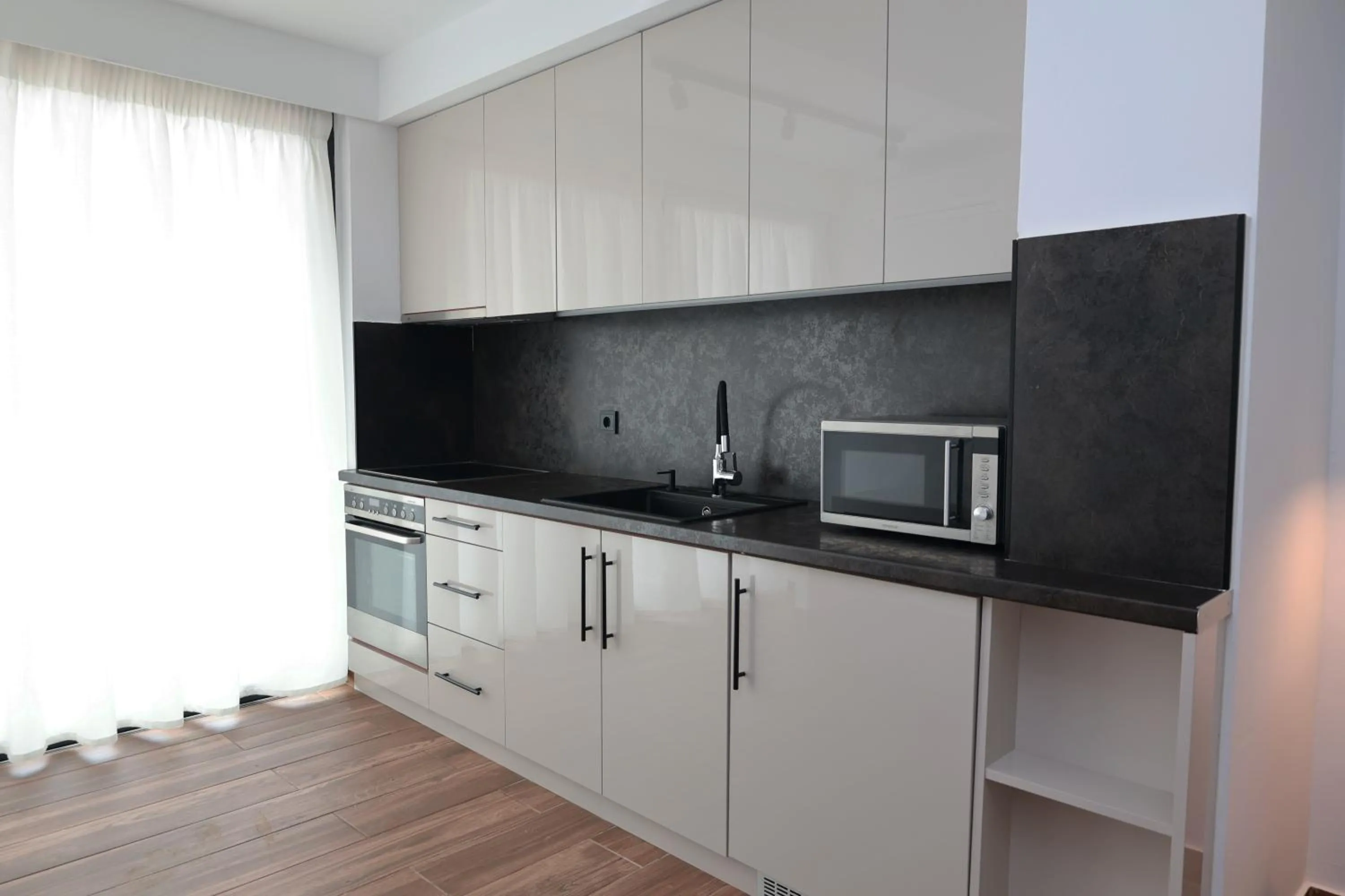 Kitchen or kitchenette in Paris-Irini Studios And Apartments