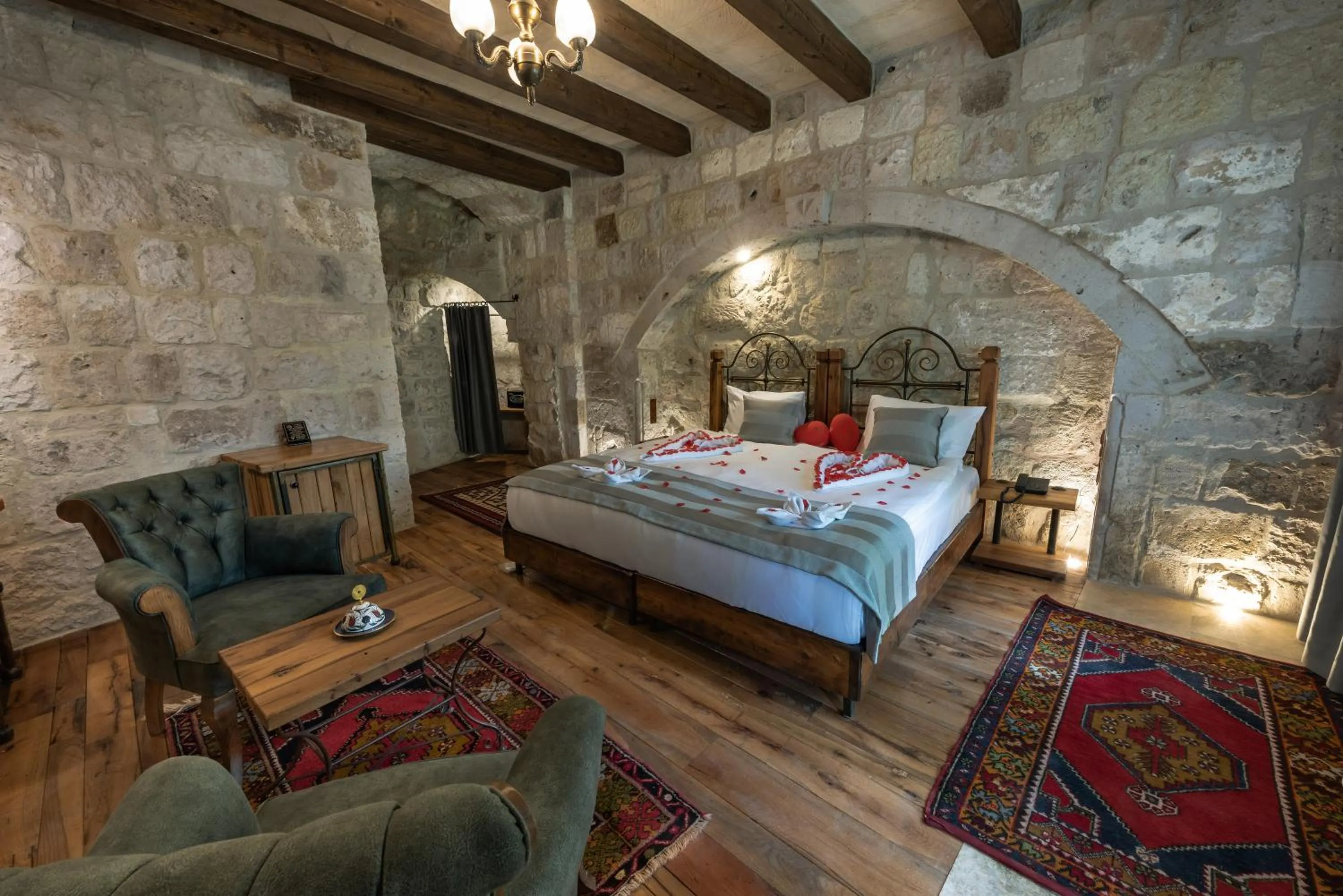 Bed in Sarnich Cave Suites
