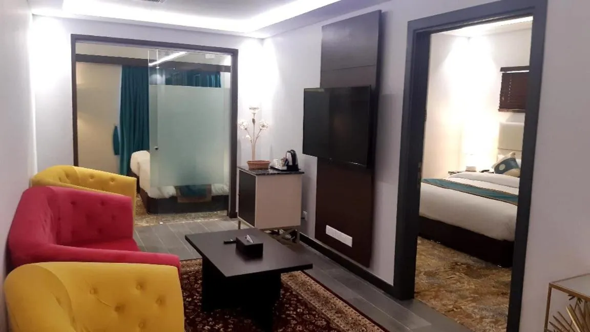 Communal lounge/ TV room in Yasrib Hospitality