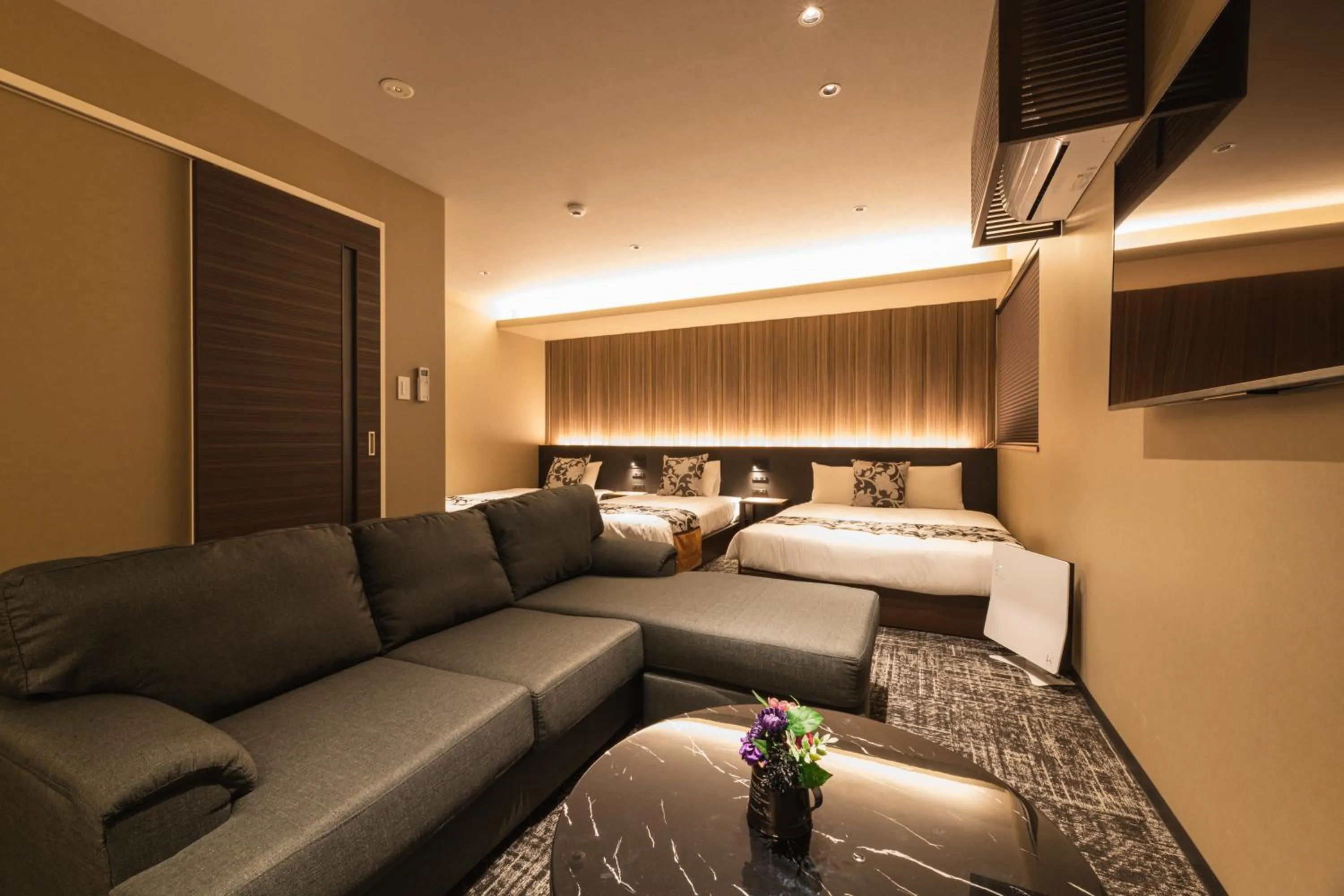 Photo of the whole room, Bed in GRAND BASE Kagoshima Chuo