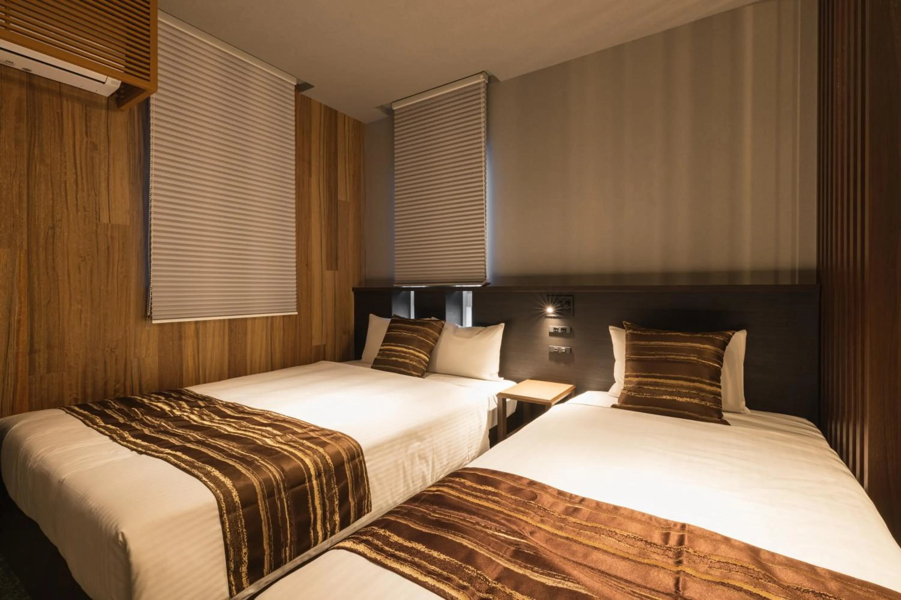 Bed in GRAND BASE Kagoshima Chuo