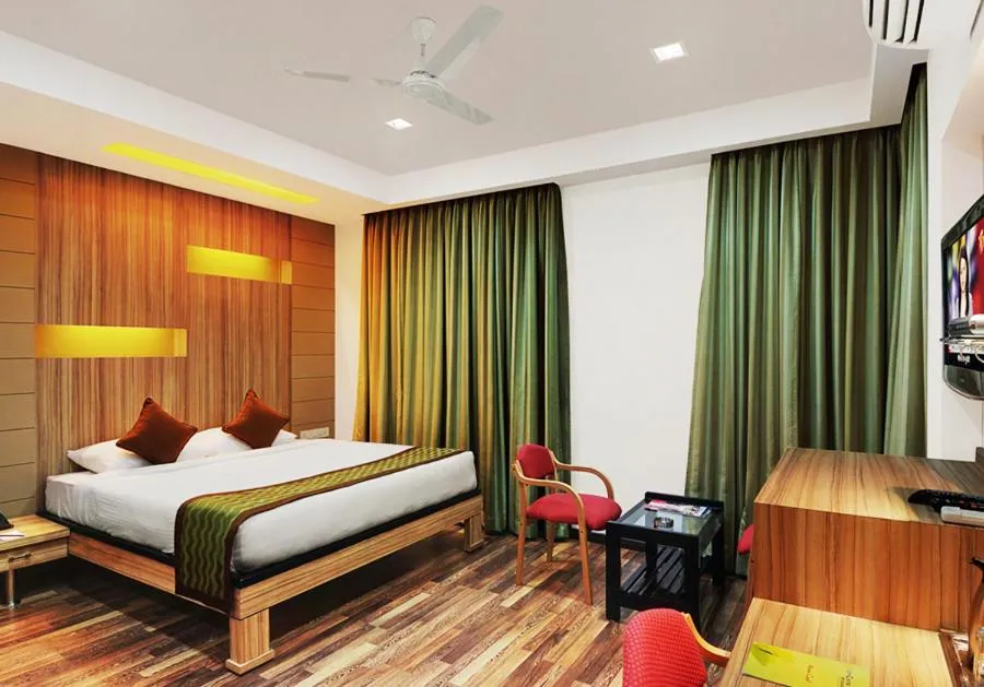 Photo of the whole room, Bed in Hotel City Centre Residency