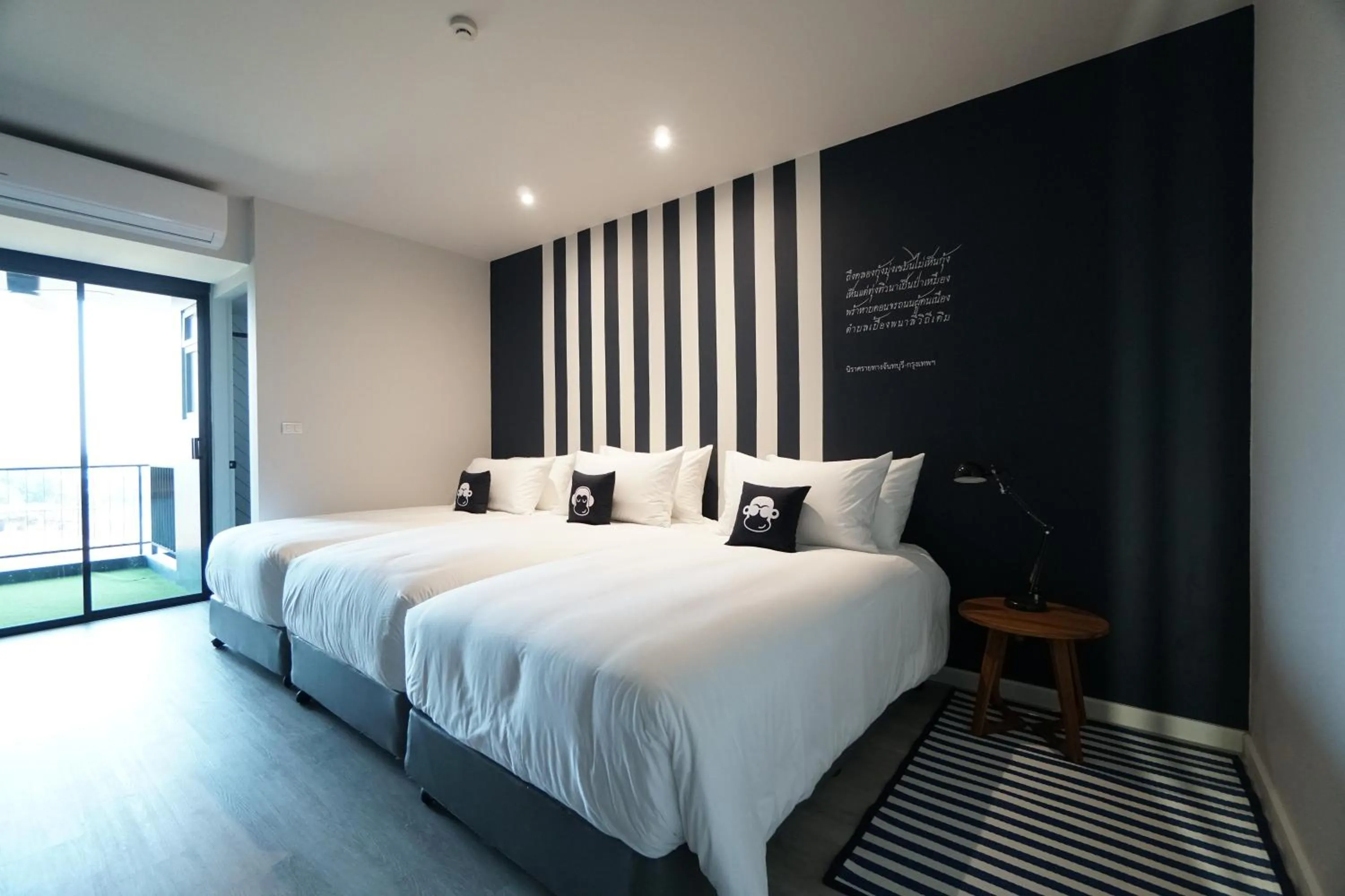 Bed in Blu Monkey Hub and Hotel Chanthaburi