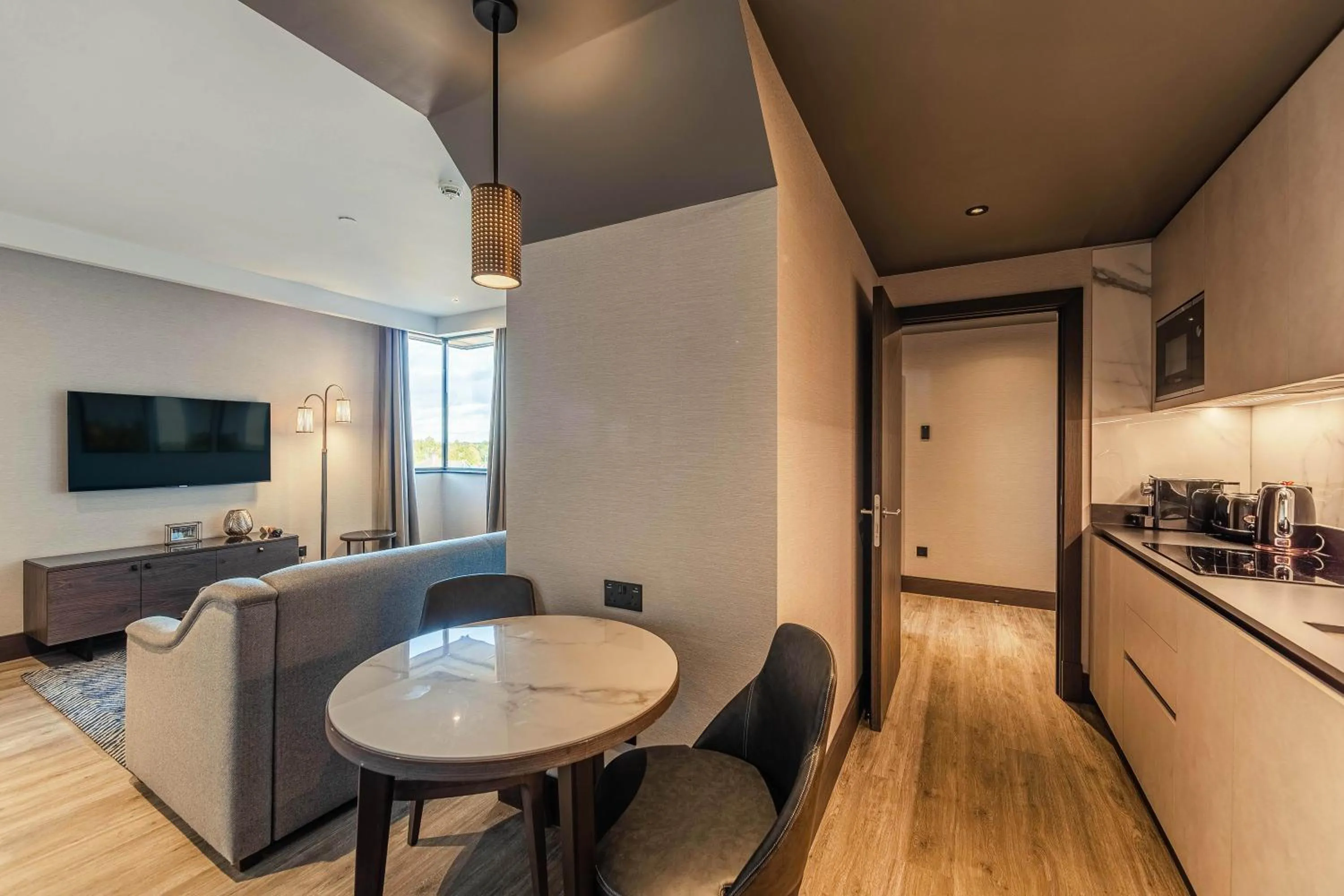 Dining area in The Fellows House Cambridge, Curio Collection By Hilton