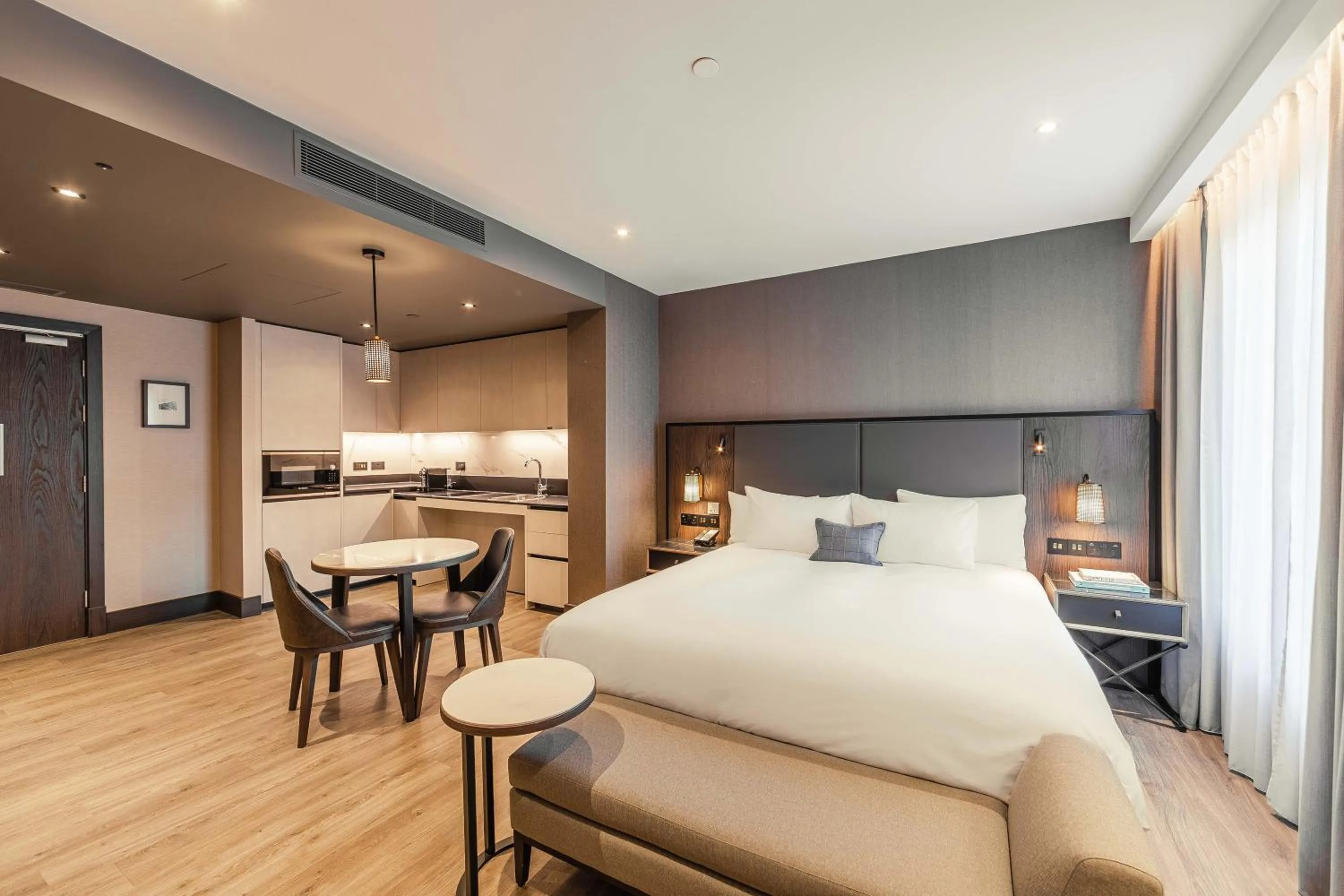 Seating area, Bed in The Fellows House Cambridge, Curio Collection By Hilton