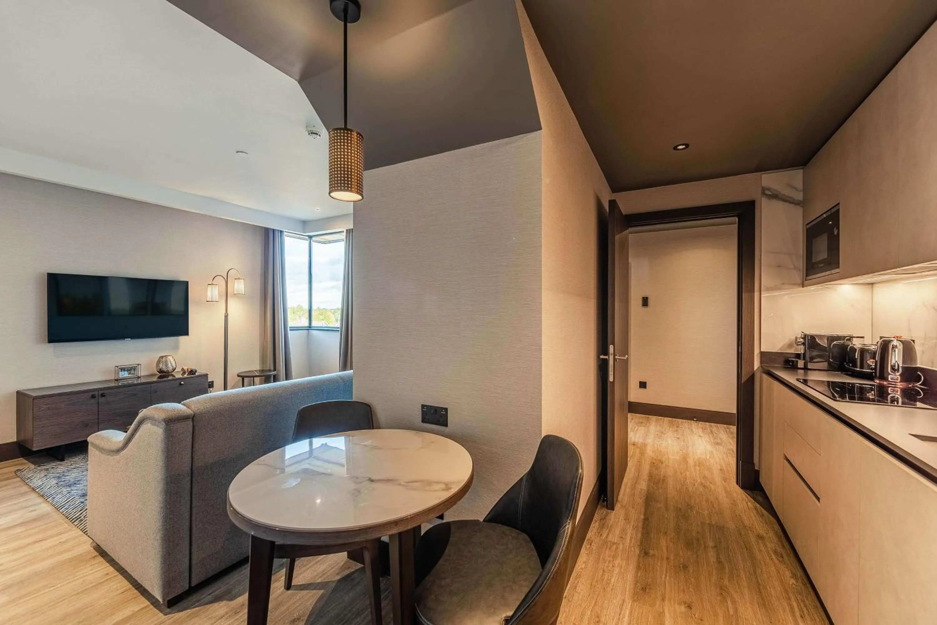 Bedroom in The Fellows House Cambridge, Curio Collection By Hilton