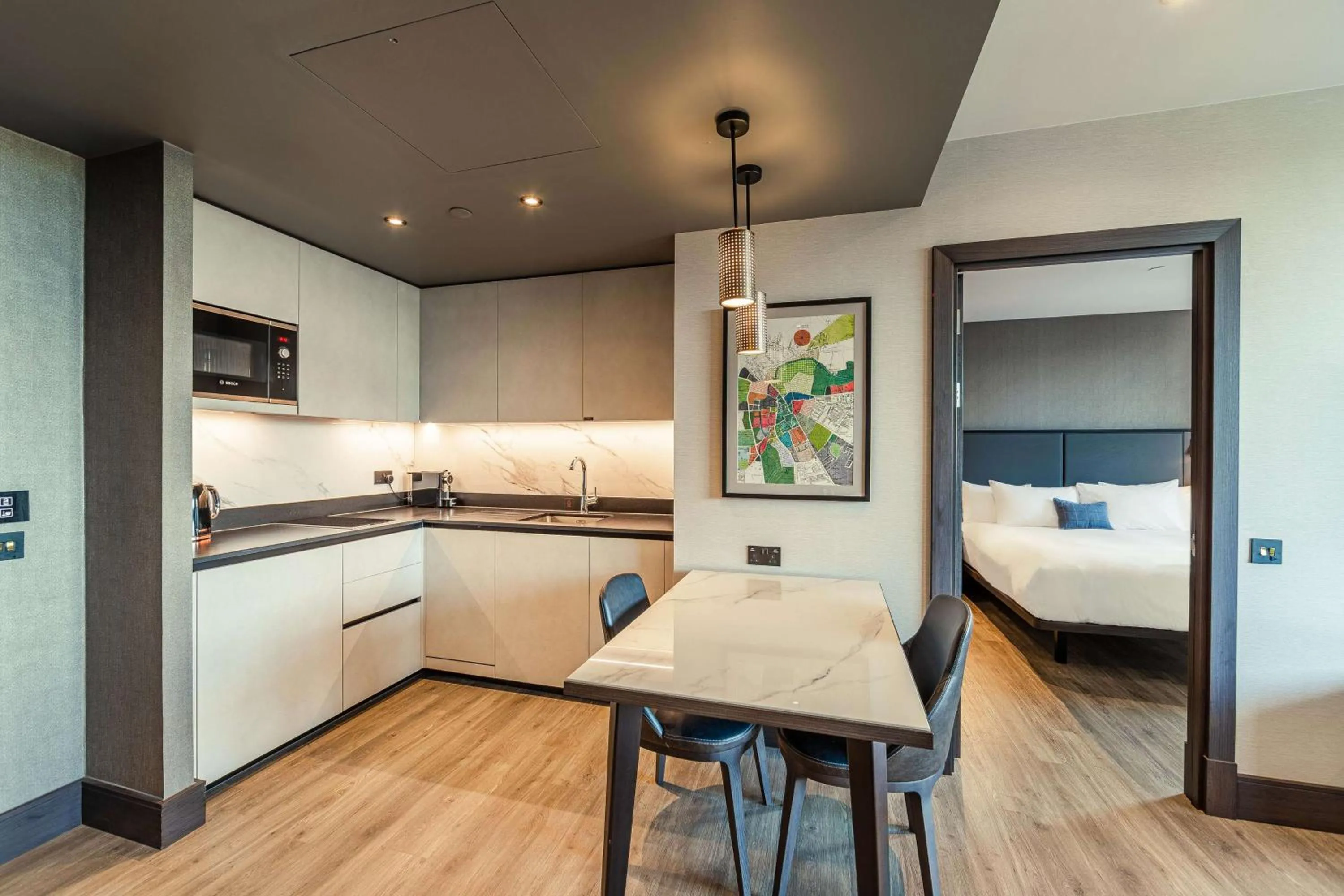 Kitchen or kitchenette in The Fellows House Cambridge, Curio Collection By Hilton