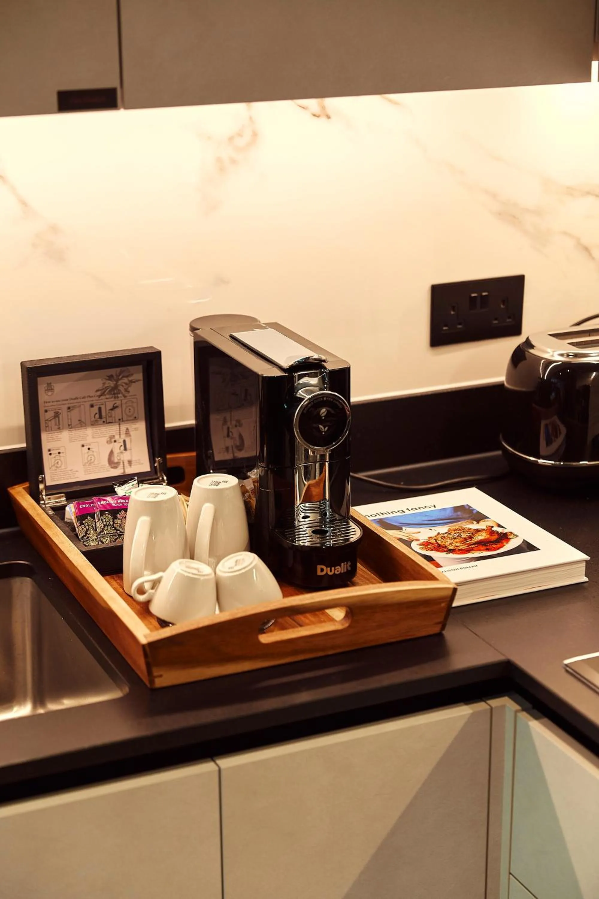 Coffee/tea facilities in The Fellows House Cambridge, Curio Collection By Hilton