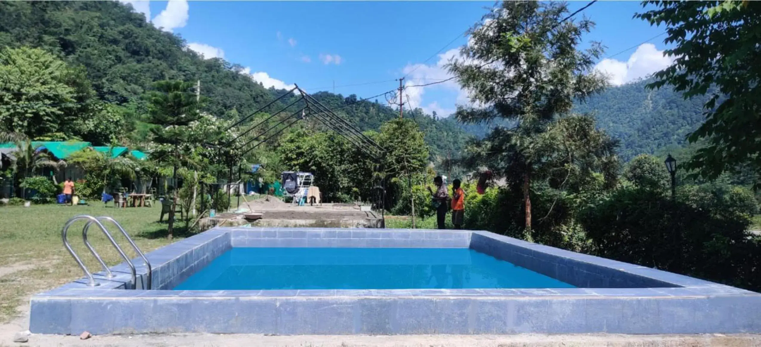 Pool view in H7Stay Luxury Cottages And Camps, Rishikesh Pool view in H7Stay Luxury Cottages And Camps, Rishikesh