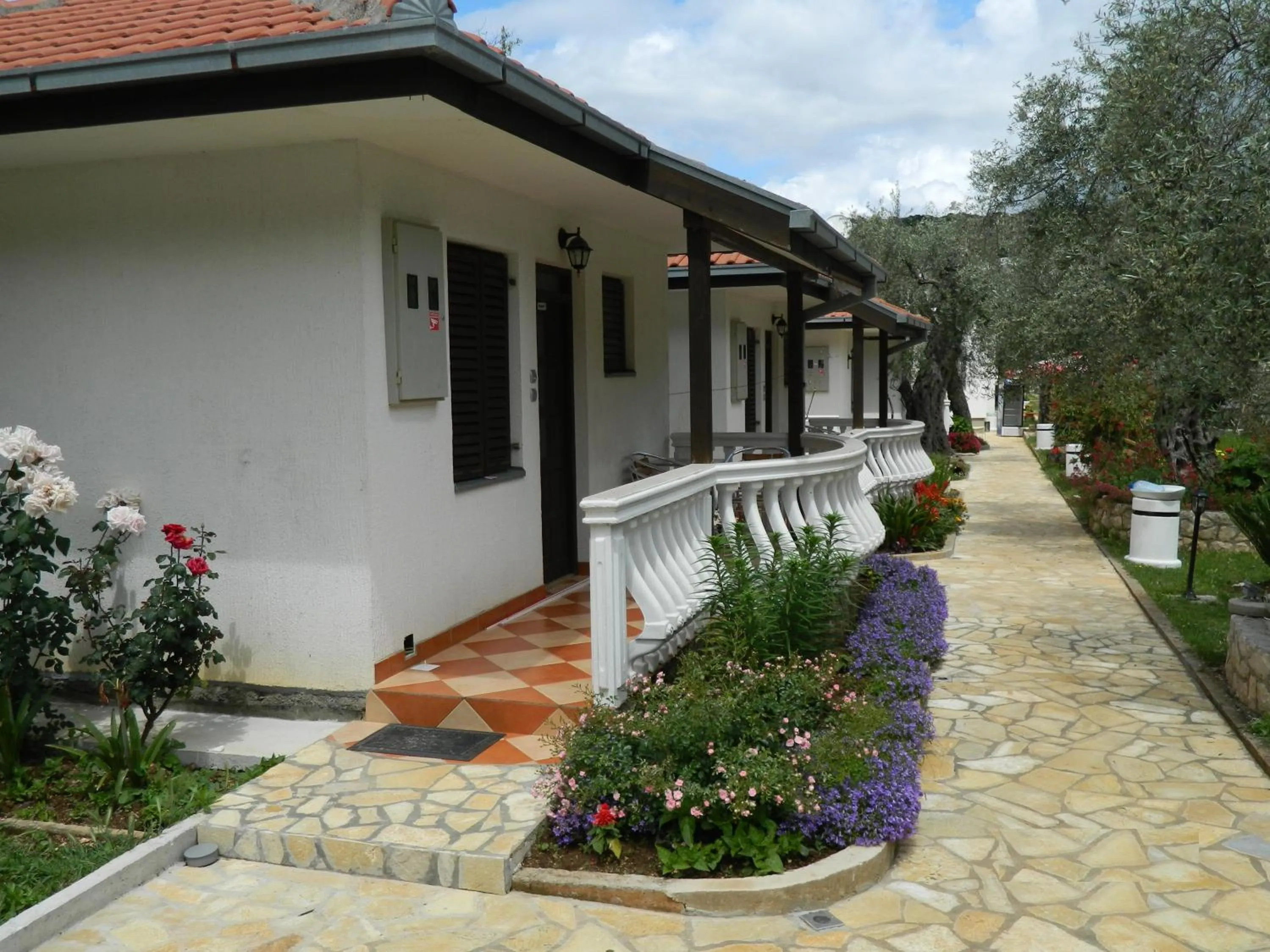 Garden in President Bungalows and Apartments