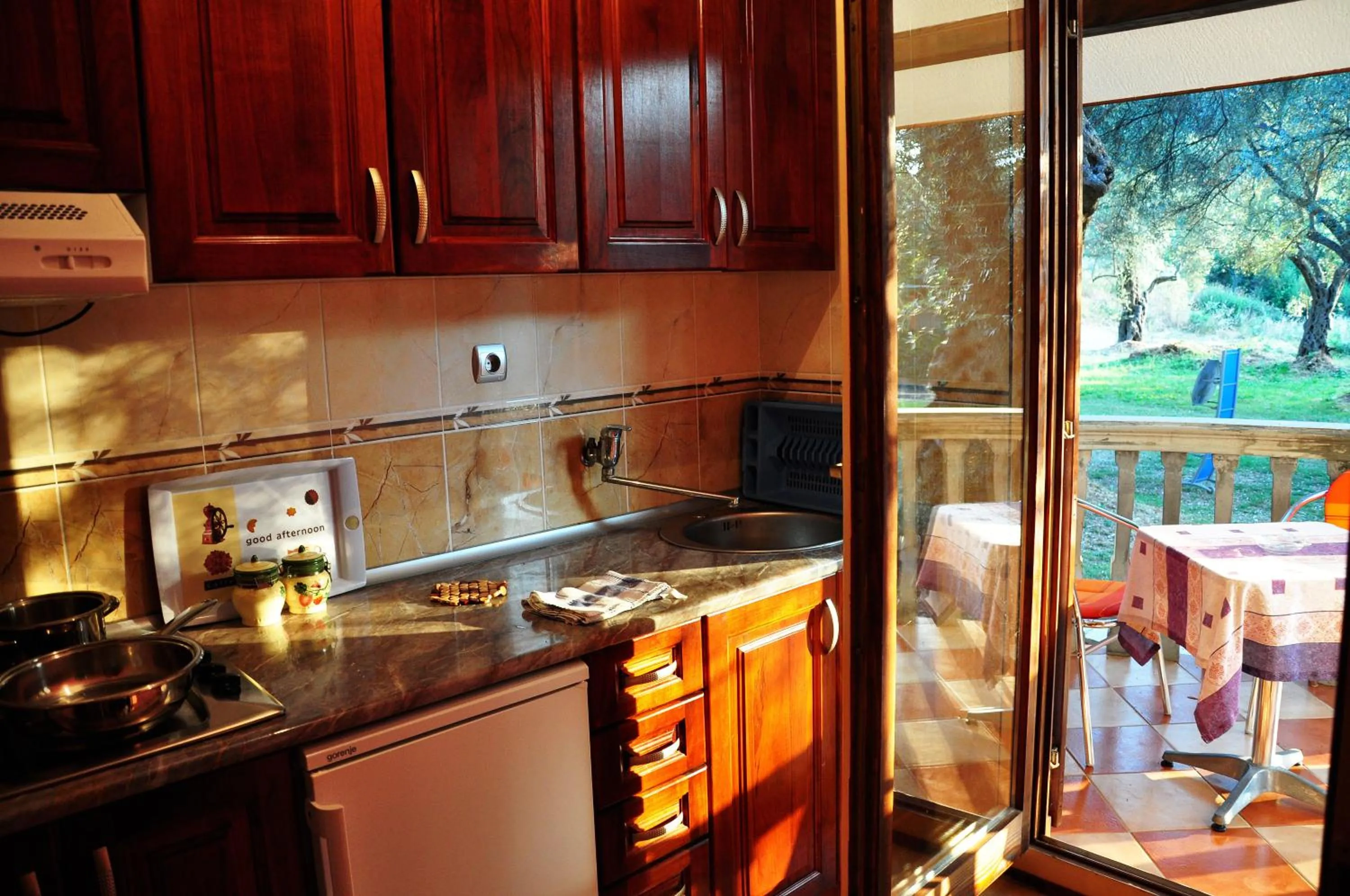 Kitchen or kitchenette in President Bungalows and Apartments