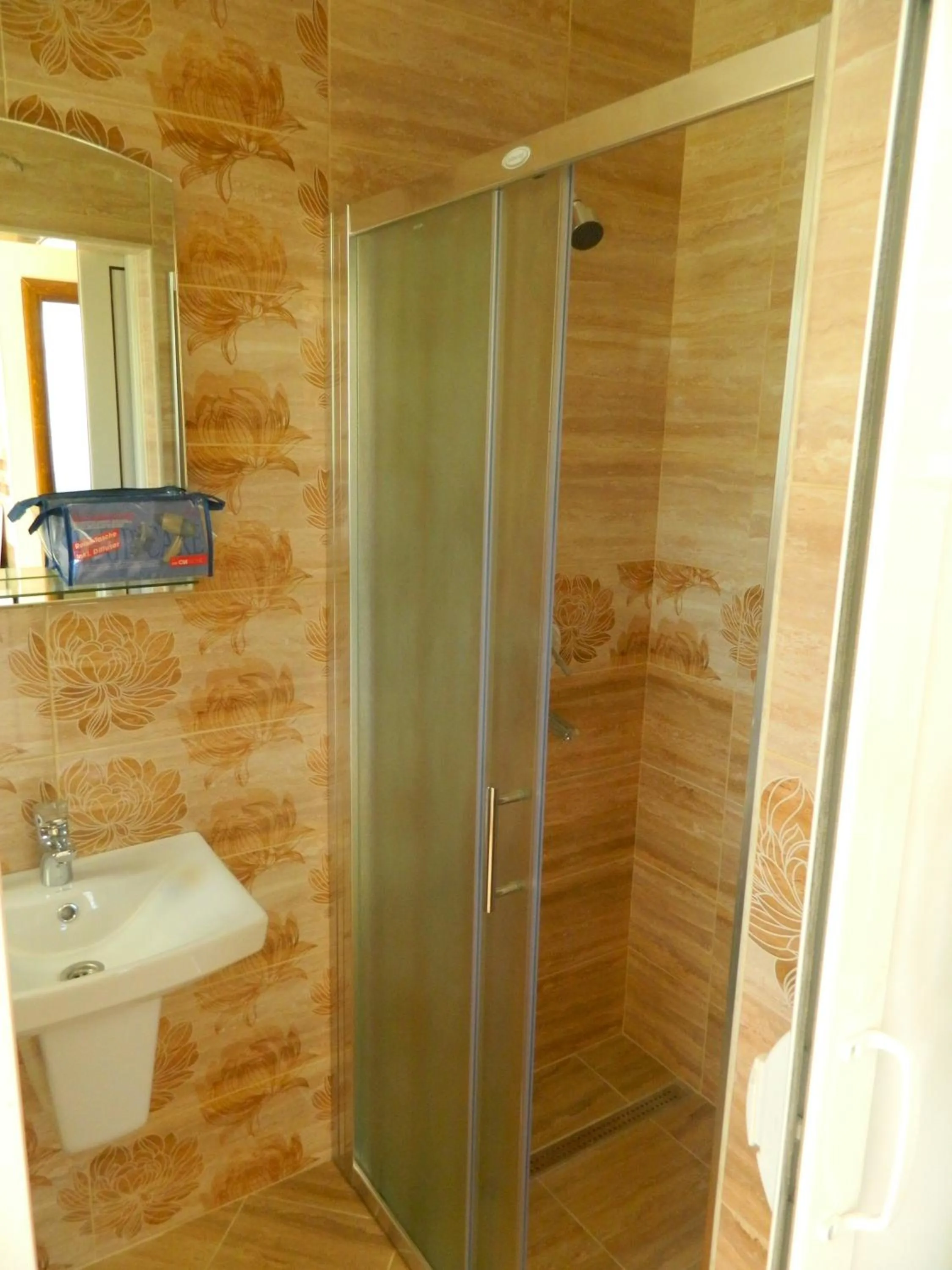 Bathroom in President Bungalows and Apartments