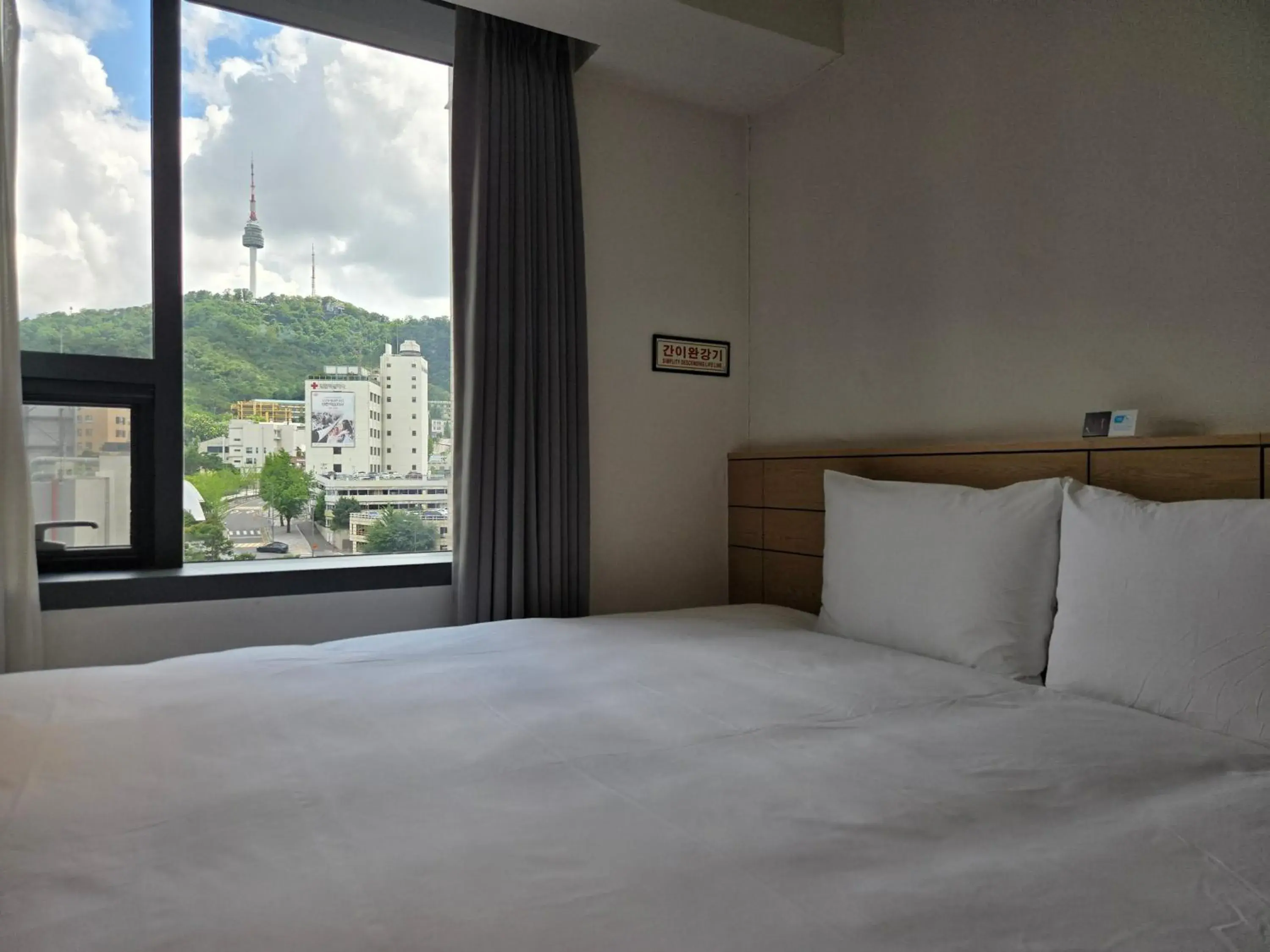 View (from property/room), Bed in Henn na Hotel Seoul Myeongdong View (from property/room), Bed in Henn na Hotel Seoul Myeongdong