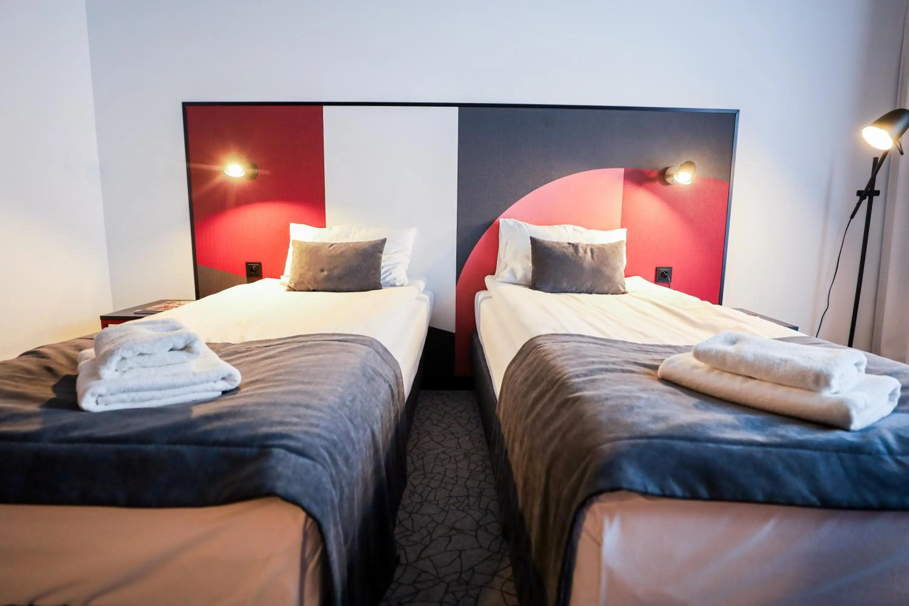 Seating area, Bed in Arche Hotel Piła