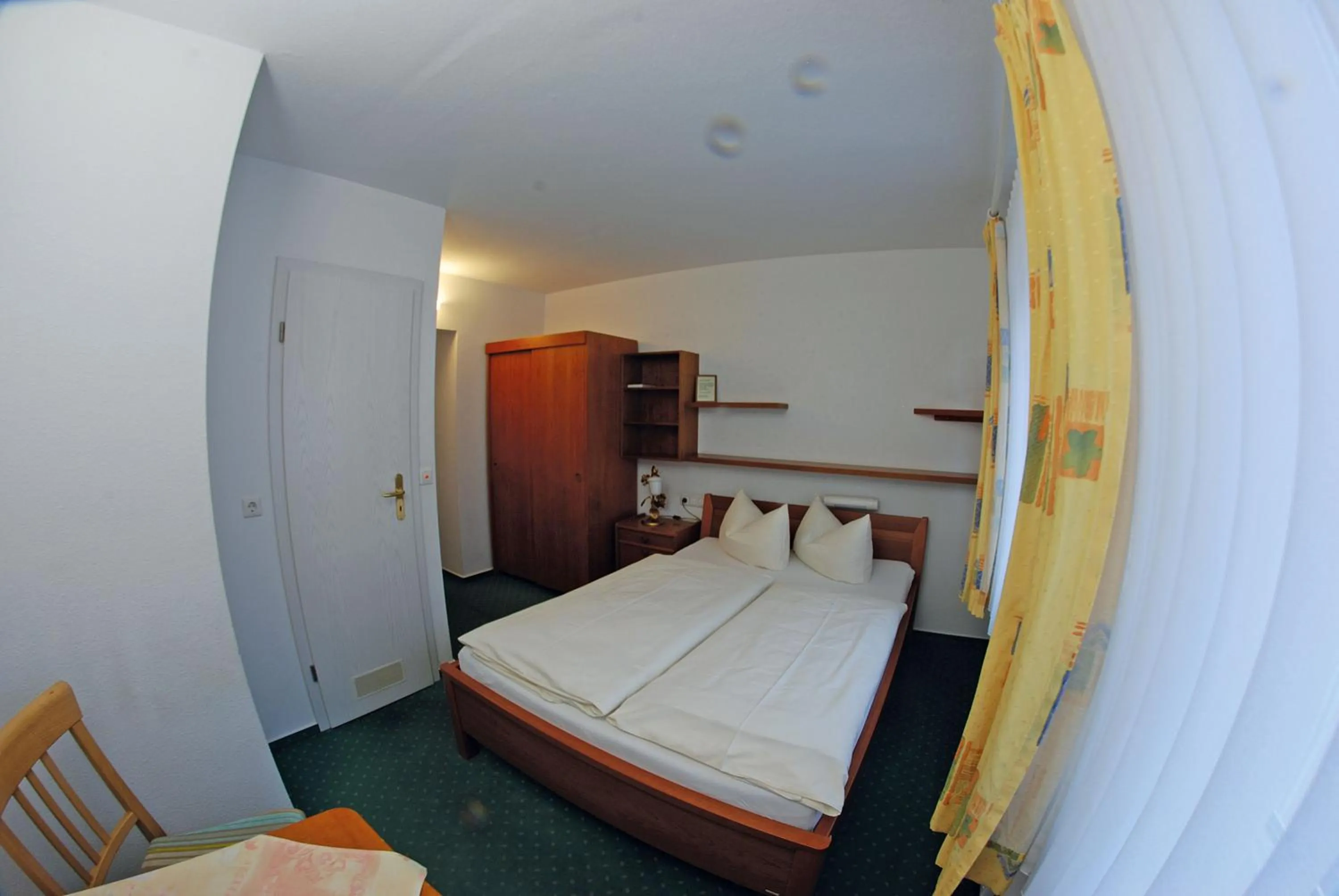 Photo of the whole room, Bed in Seehotel ZUR MÜNZ