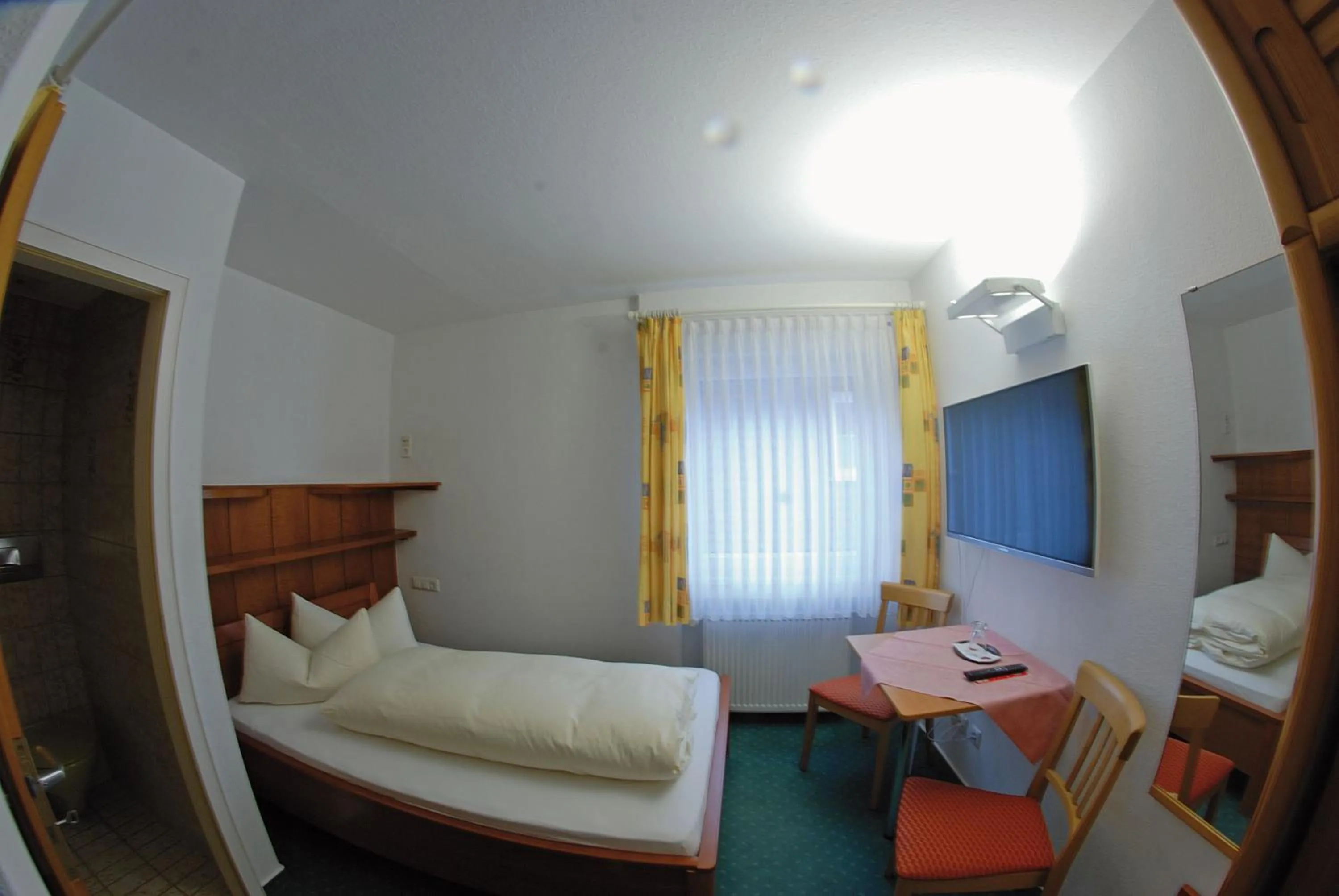 Photo of the whole room, Bed in Seehotel ZUR MÜNZ