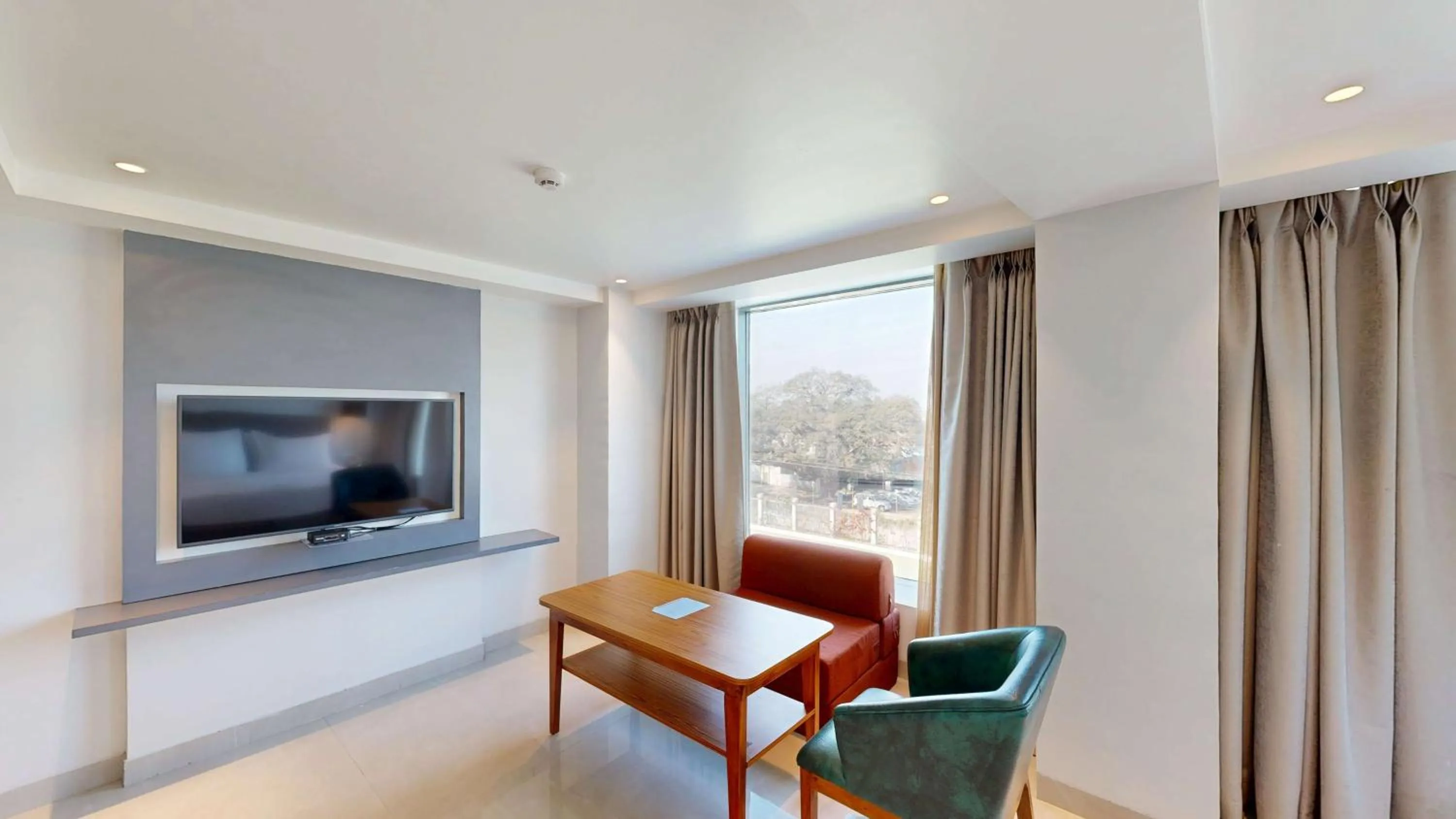 Bedroom in Radisson Hotel Bareilly Airport