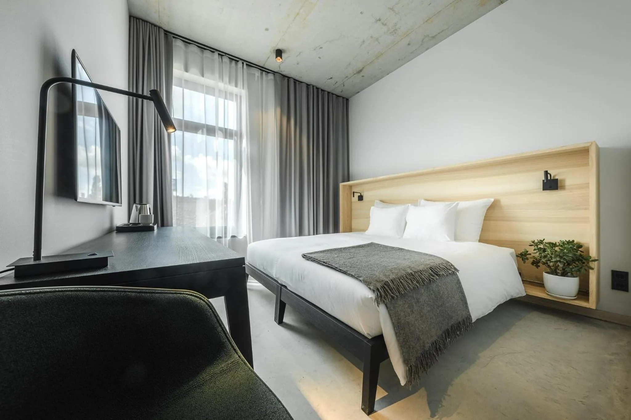 Bed in OTTO Hotel & Sun