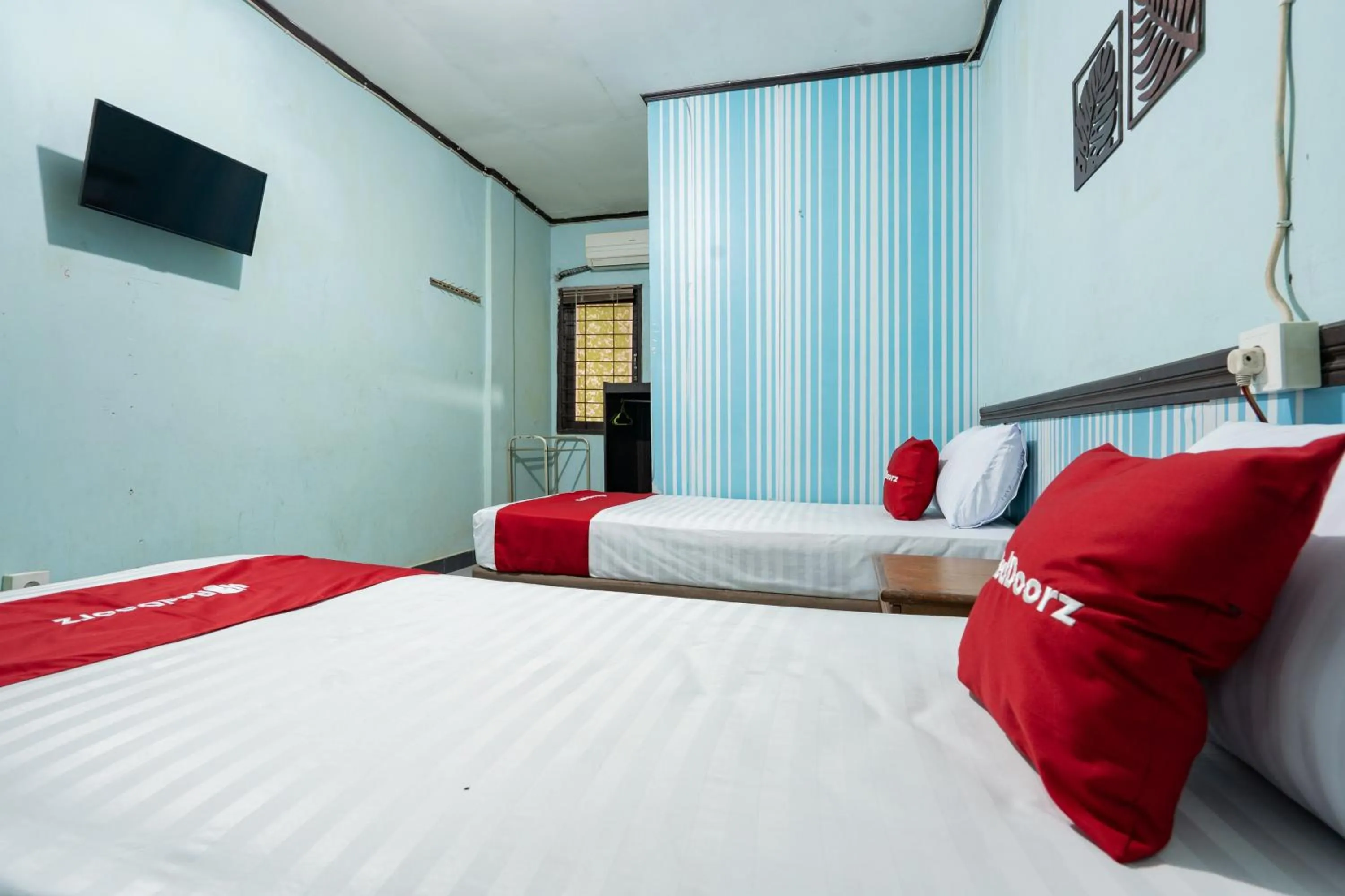 Bedroom, Bed in RedDoorz Syariah near Pasar Pagi Samarinda