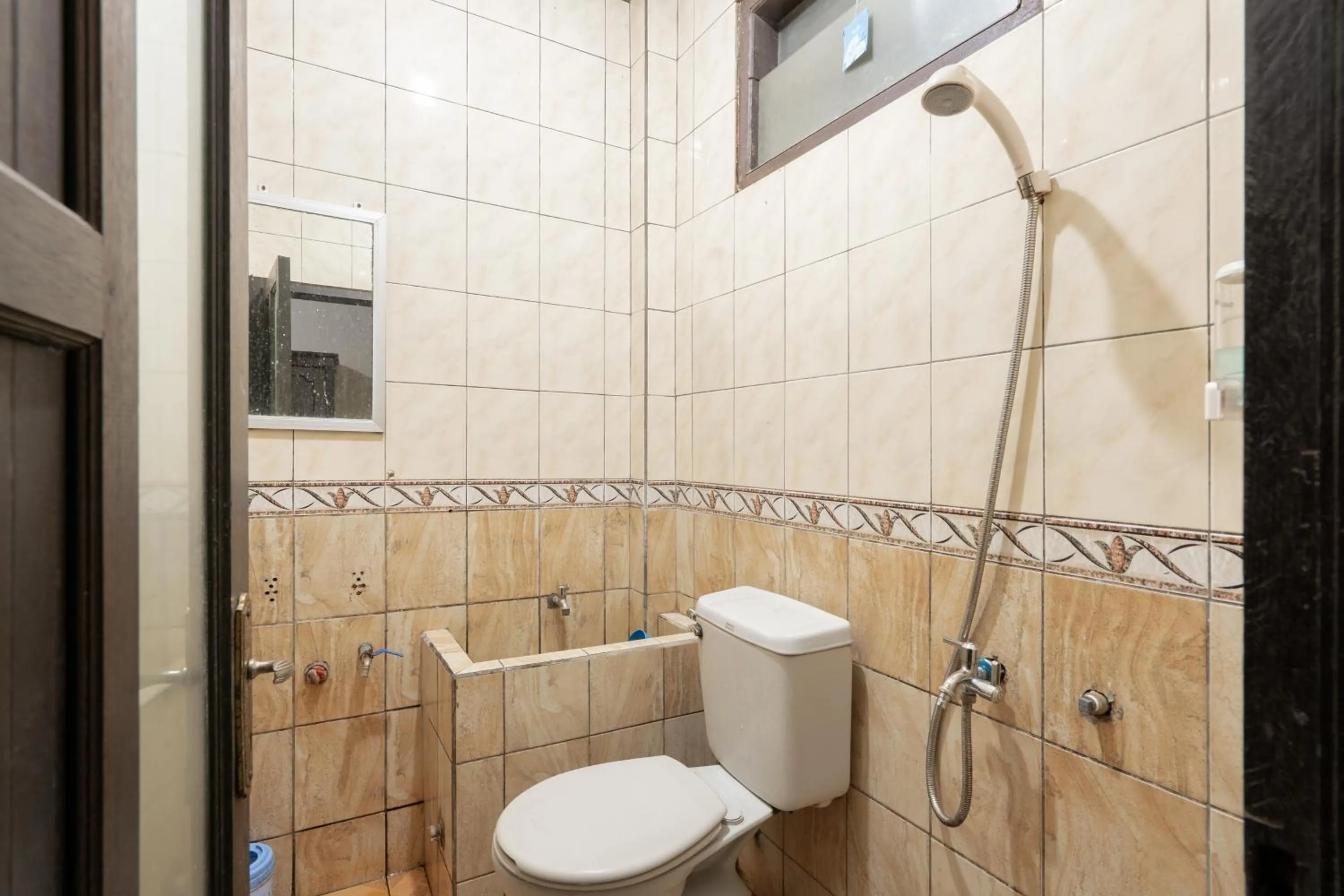 Bathroom in RedDoorz Syariah near Pasar Pagi Samarinda