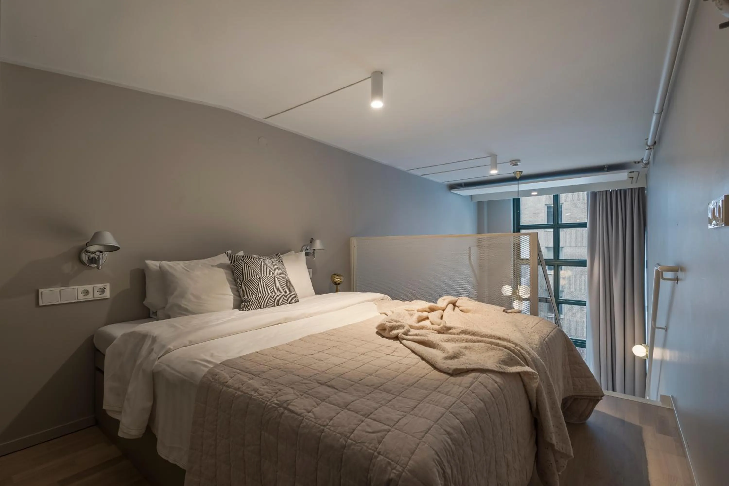 Bed in Unity Hammarby Sjöstad - A Studio Hotel