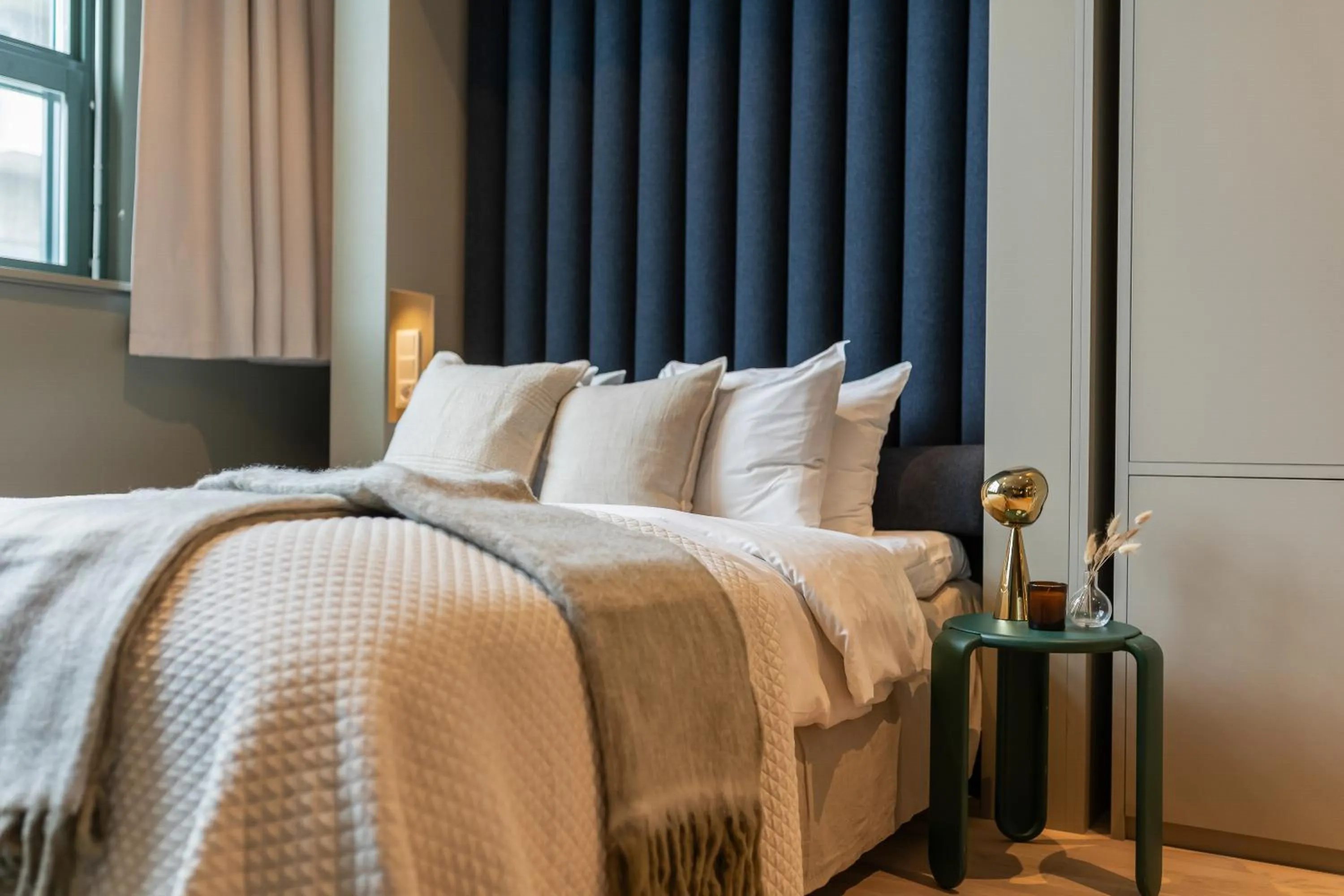 Bed in Unity Hammarby Sjöstad - A Studio Hotel