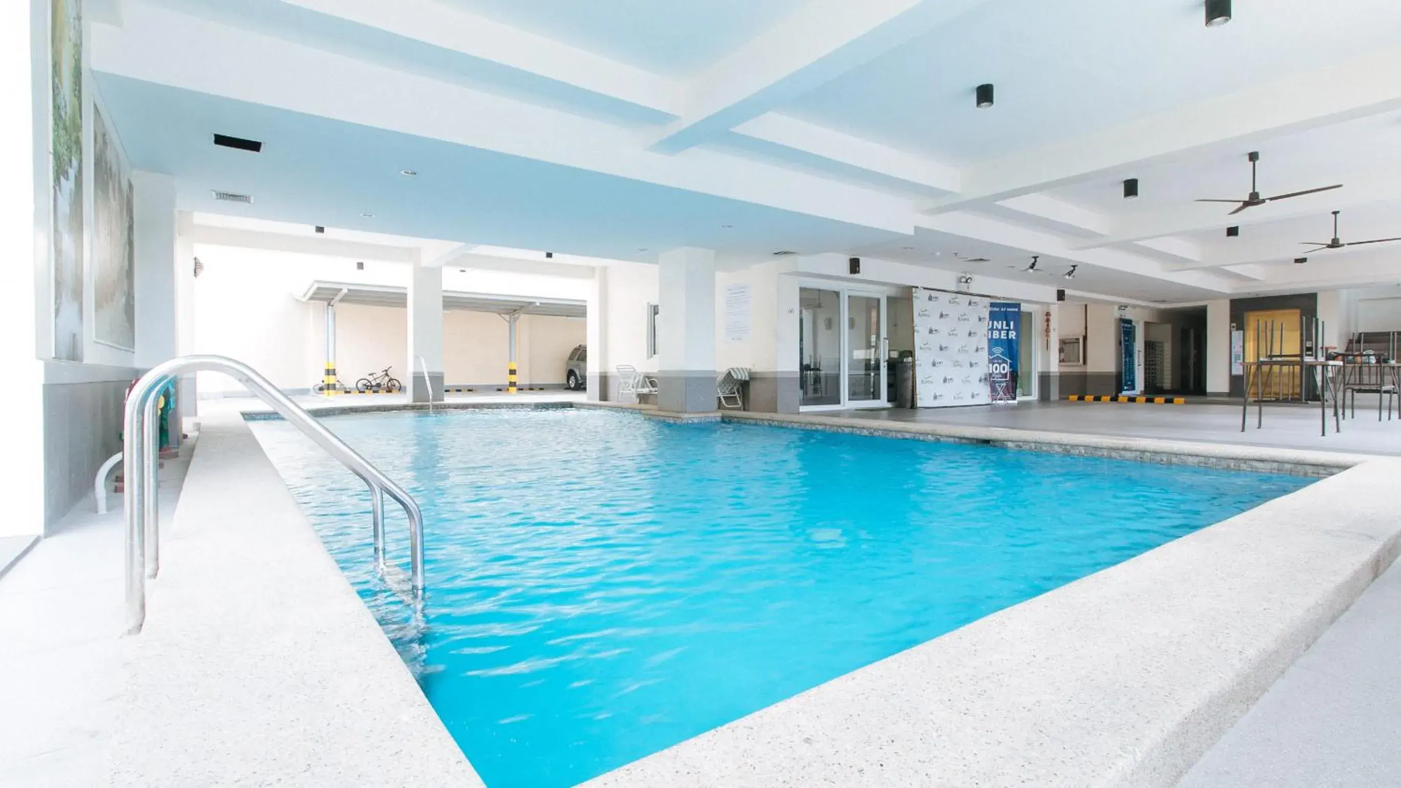 Pool view in RedDoorz Plus at Alpina Heights Paranaque Pool view in RedDoorz Plus at Alpina Heights Paranaque